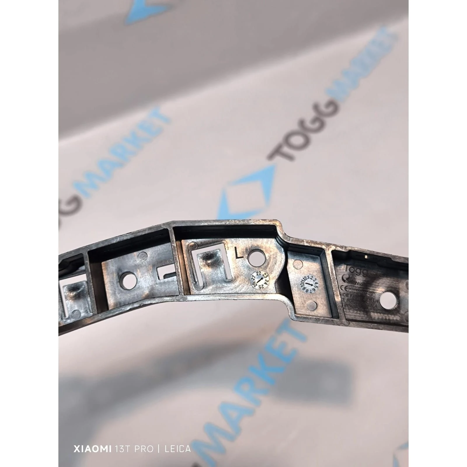 TOGG T10X ÖN TAMPON TUTUCU BRAKET SOL