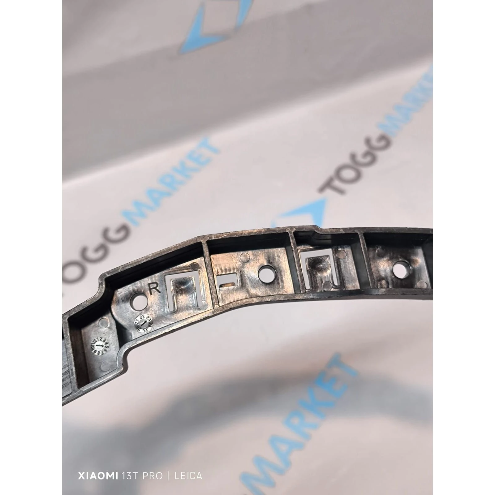 TOGG T10X ÖN TAMPON TUTUCU BRAKET SOL