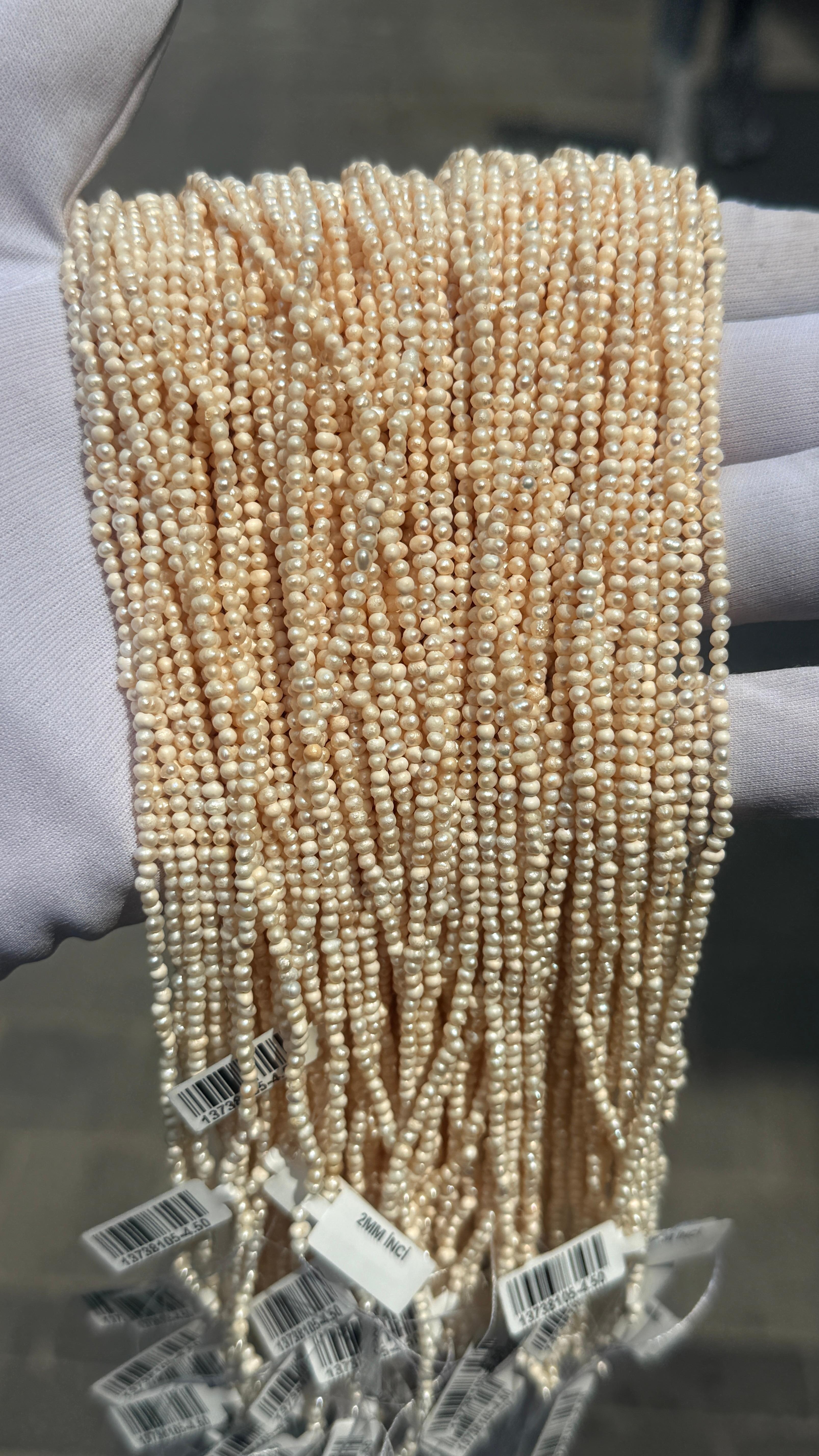 2mm kum inci