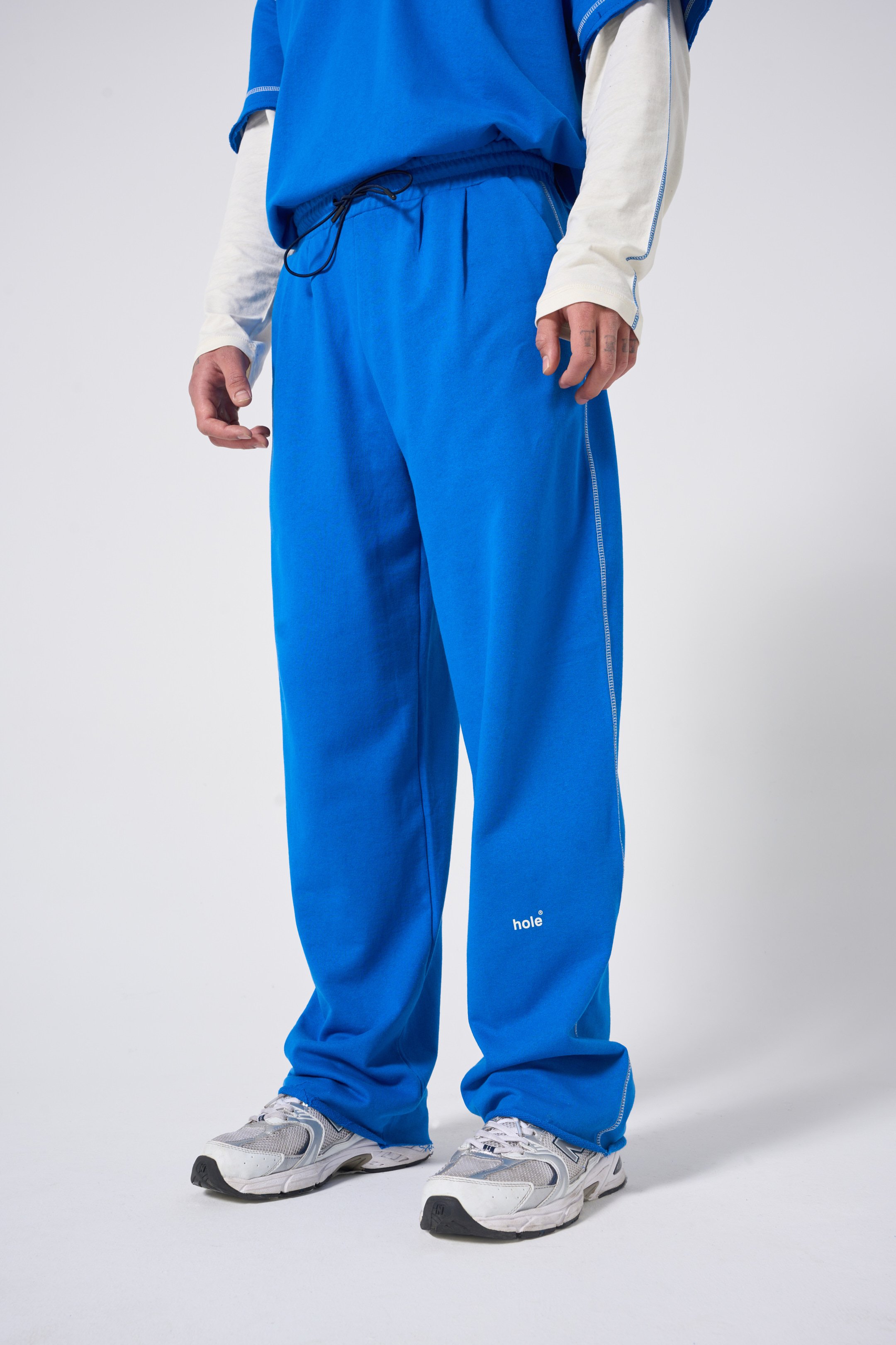 Hole Oversize Sweatpants w/ flatlock stitch details - SAXE BLUE