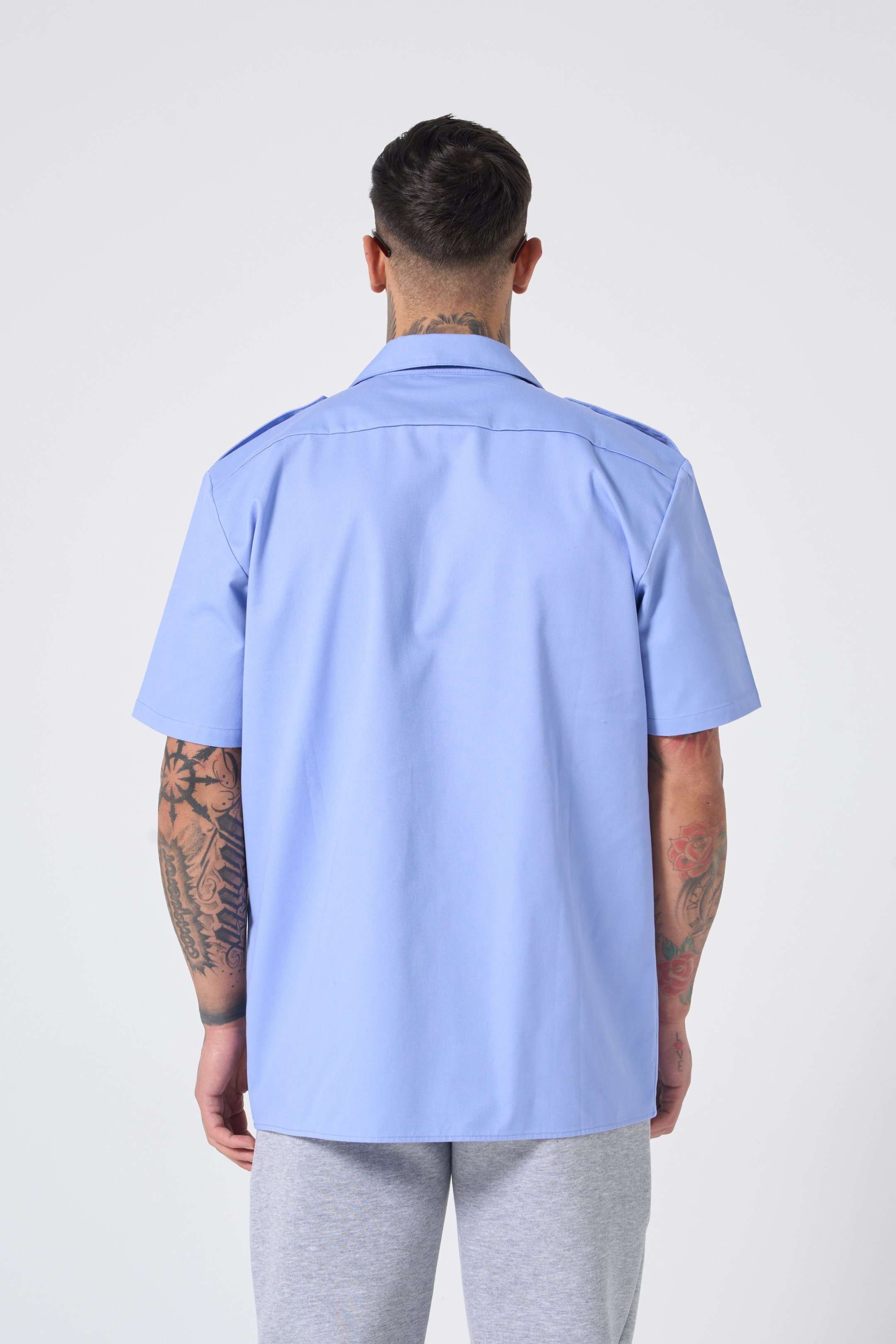 Hole Shirt w/ epaulet details with embroided logo - INDIGO BLUE