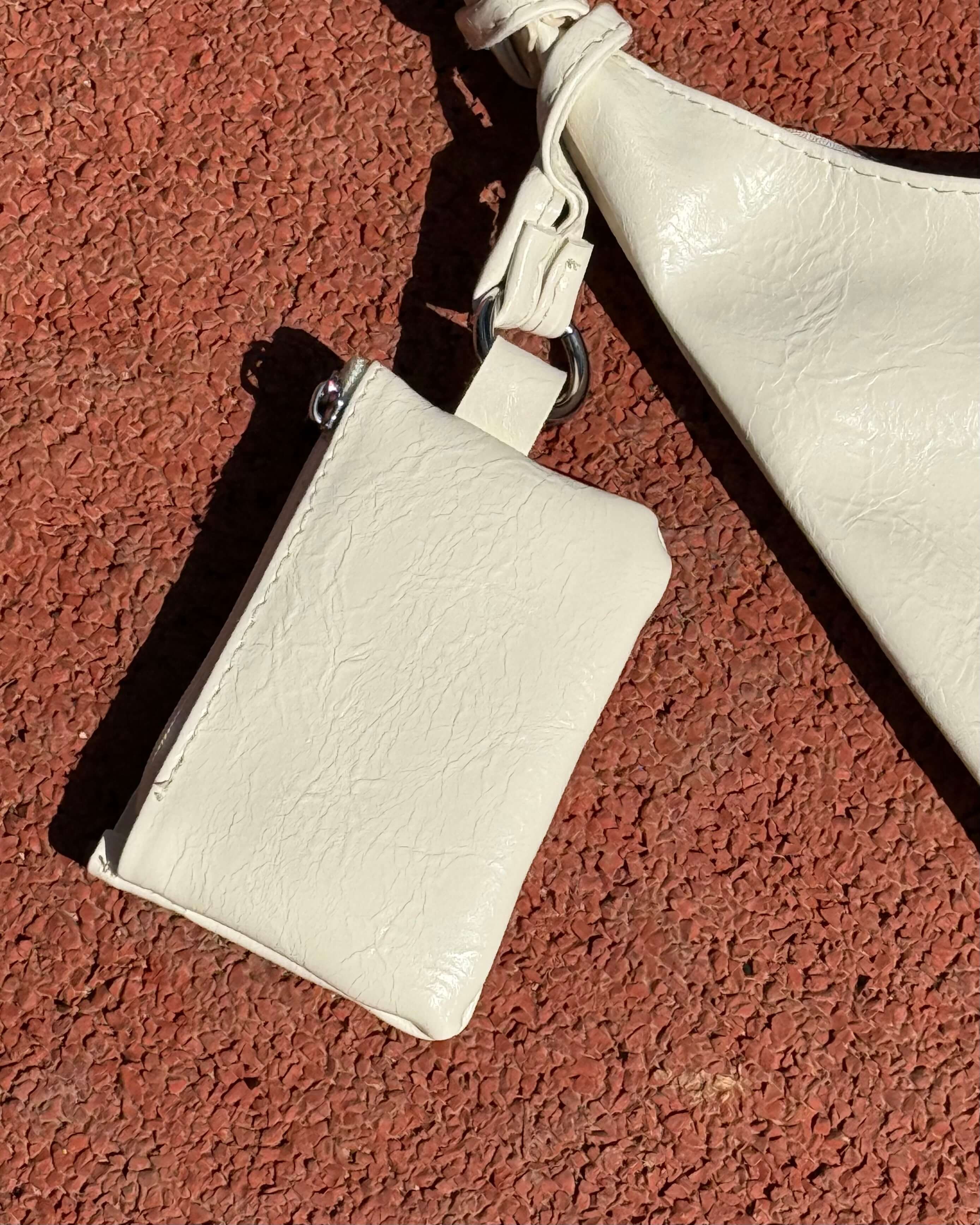 DAHLIA BEIGE DİKİŞ DETAYLI KOL ÇANTASI