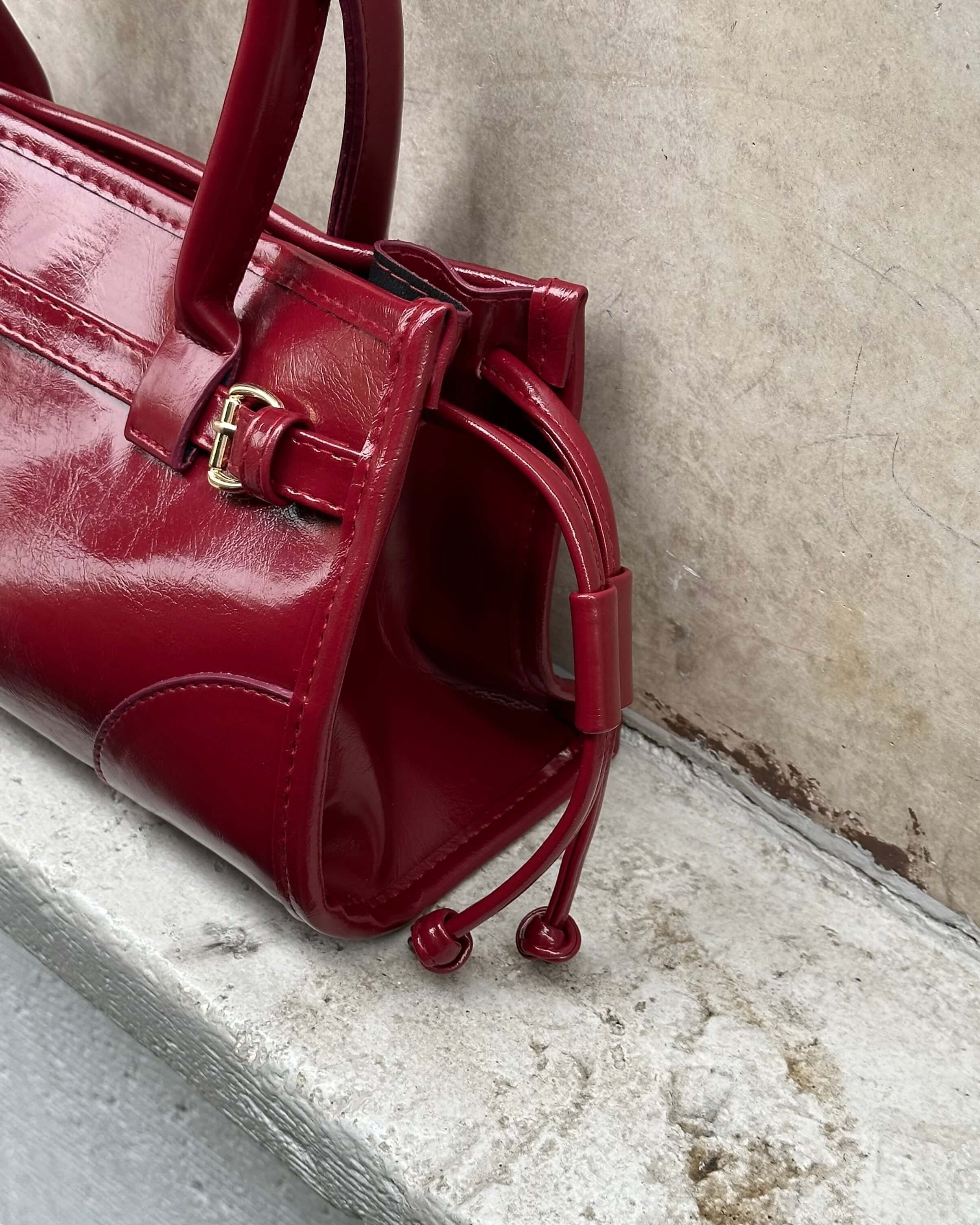SHAPER CLARET RED ŞERİT KEMER DETAYLI EL ÇANTASI