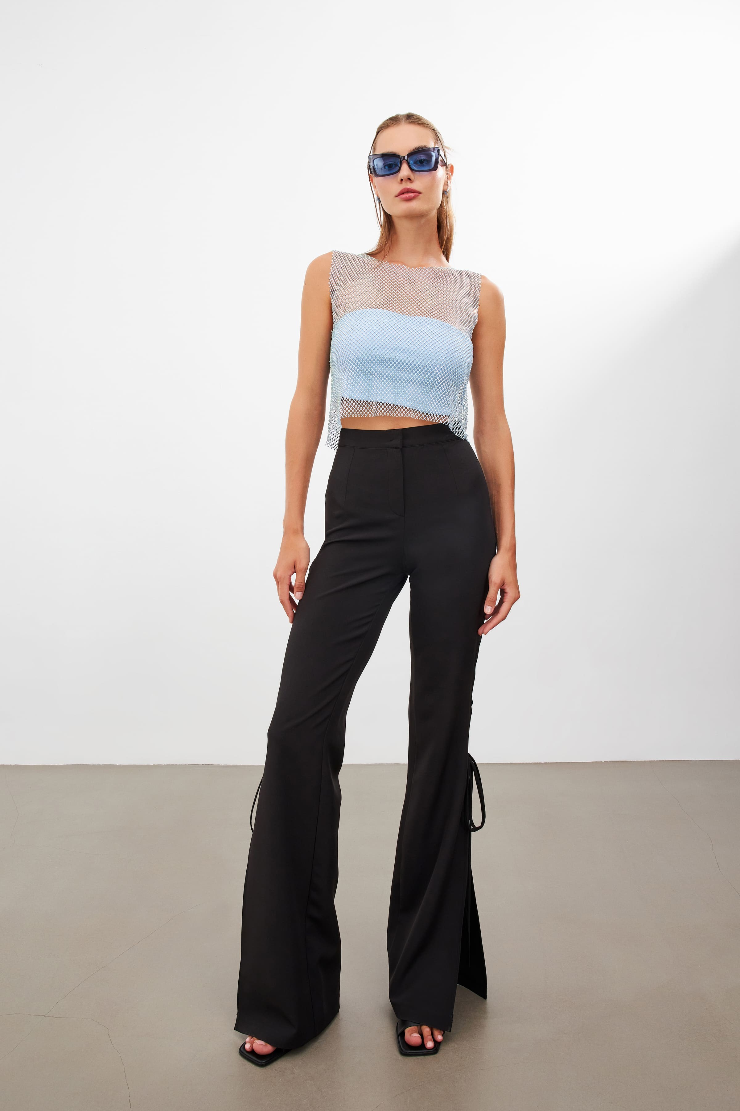 MERIMER- TROUSERS WITH CUTOUT DETAILS 