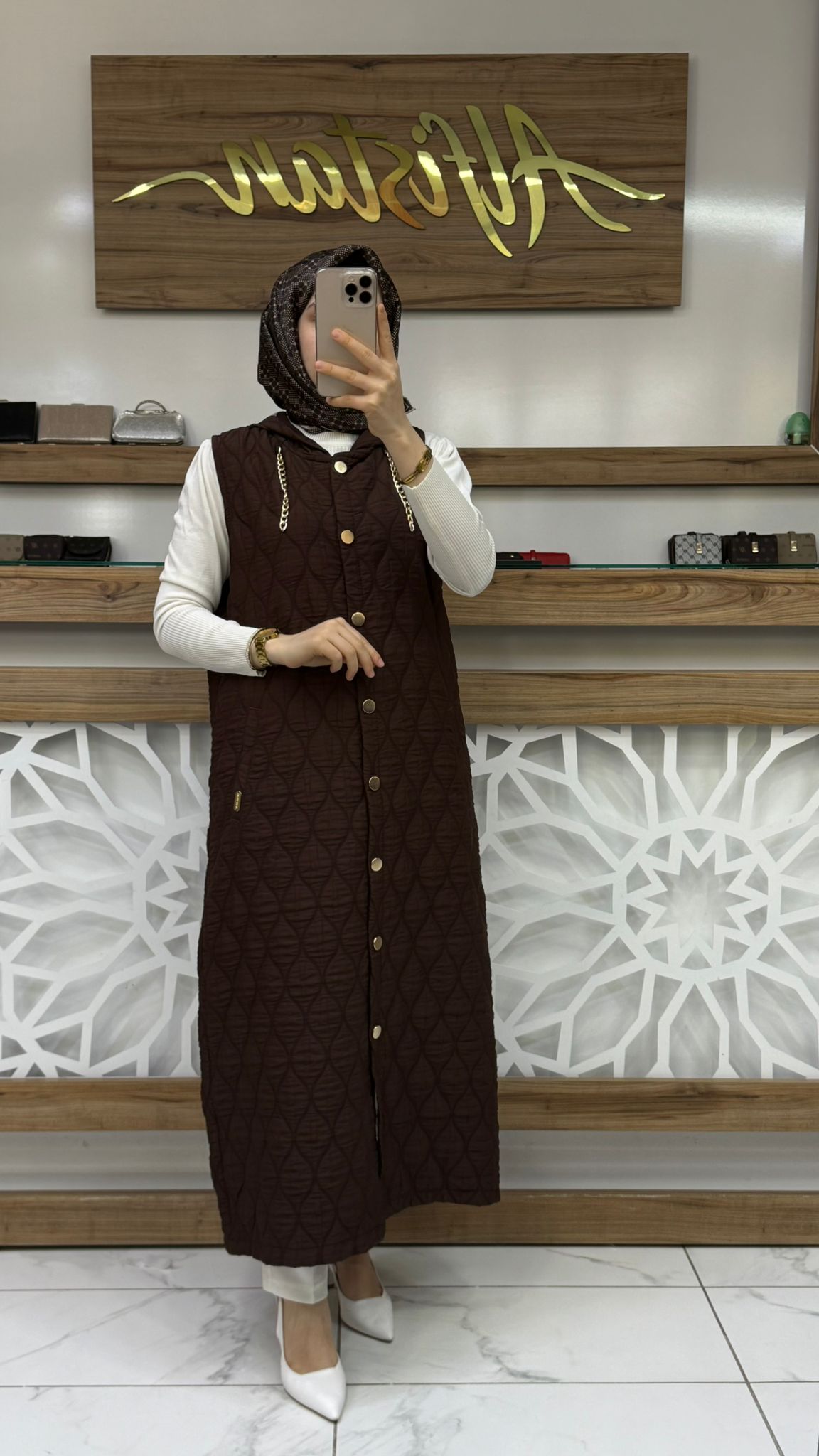  Zincir Detaylı Kapitone Uzun Kadın Tesettür Yelek akay 21702 - Kahvrengi