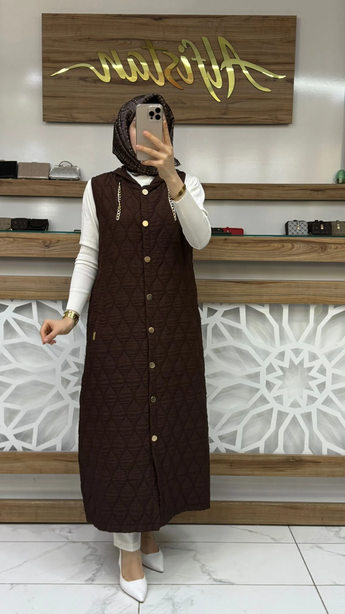  Zincir Detaylı Kapitone Uzun Kadın Tesettür Yelek akay 21702