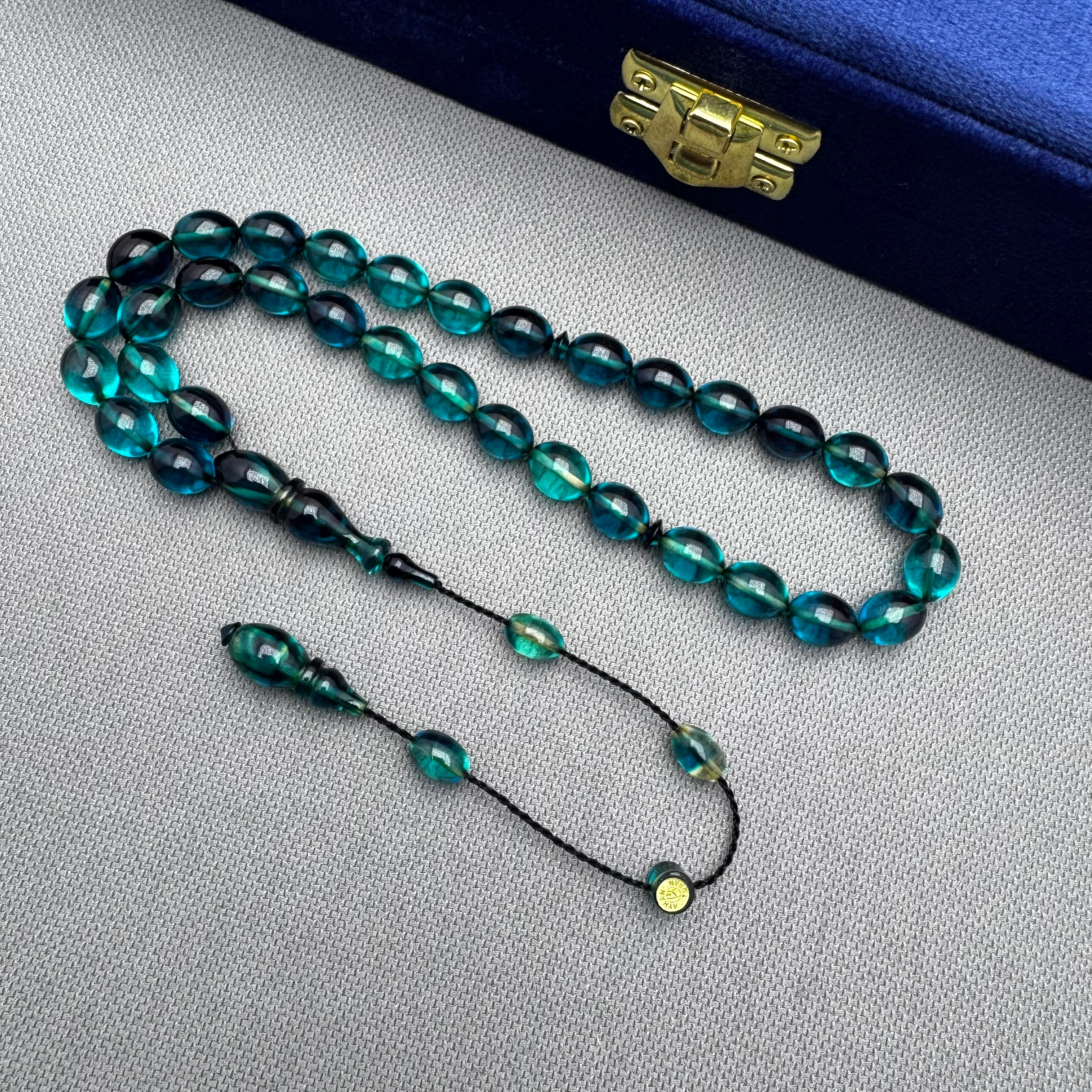 Ayhan TURAN Usta İşçilikli Petrol Mavisi Hareli Beyzi Kesim Ateş Kehribar Tespih