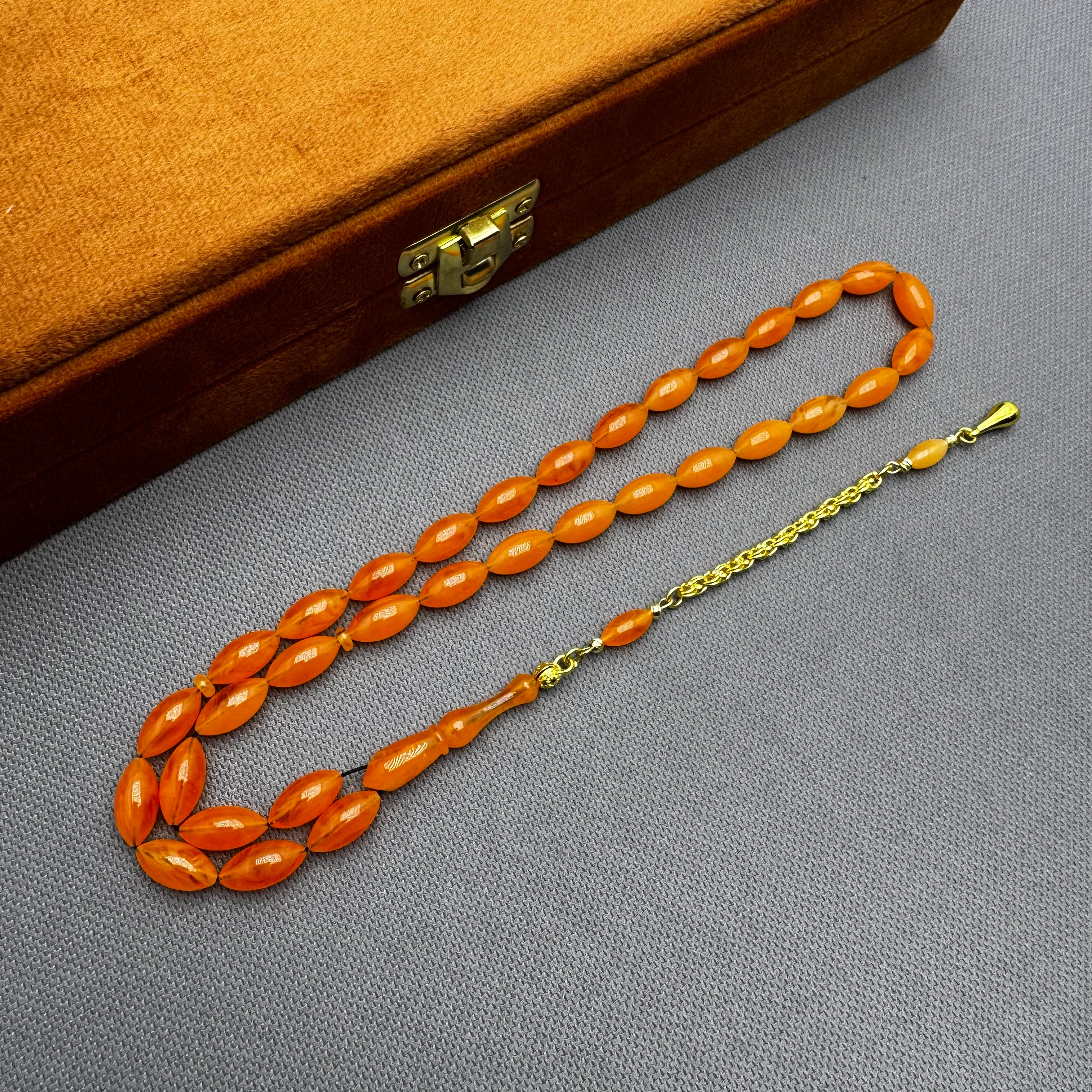 Usta İşçilikli 925 Ayar Gümüş Püsküllü Turuncu Hareli Alman Bakalit Tespih