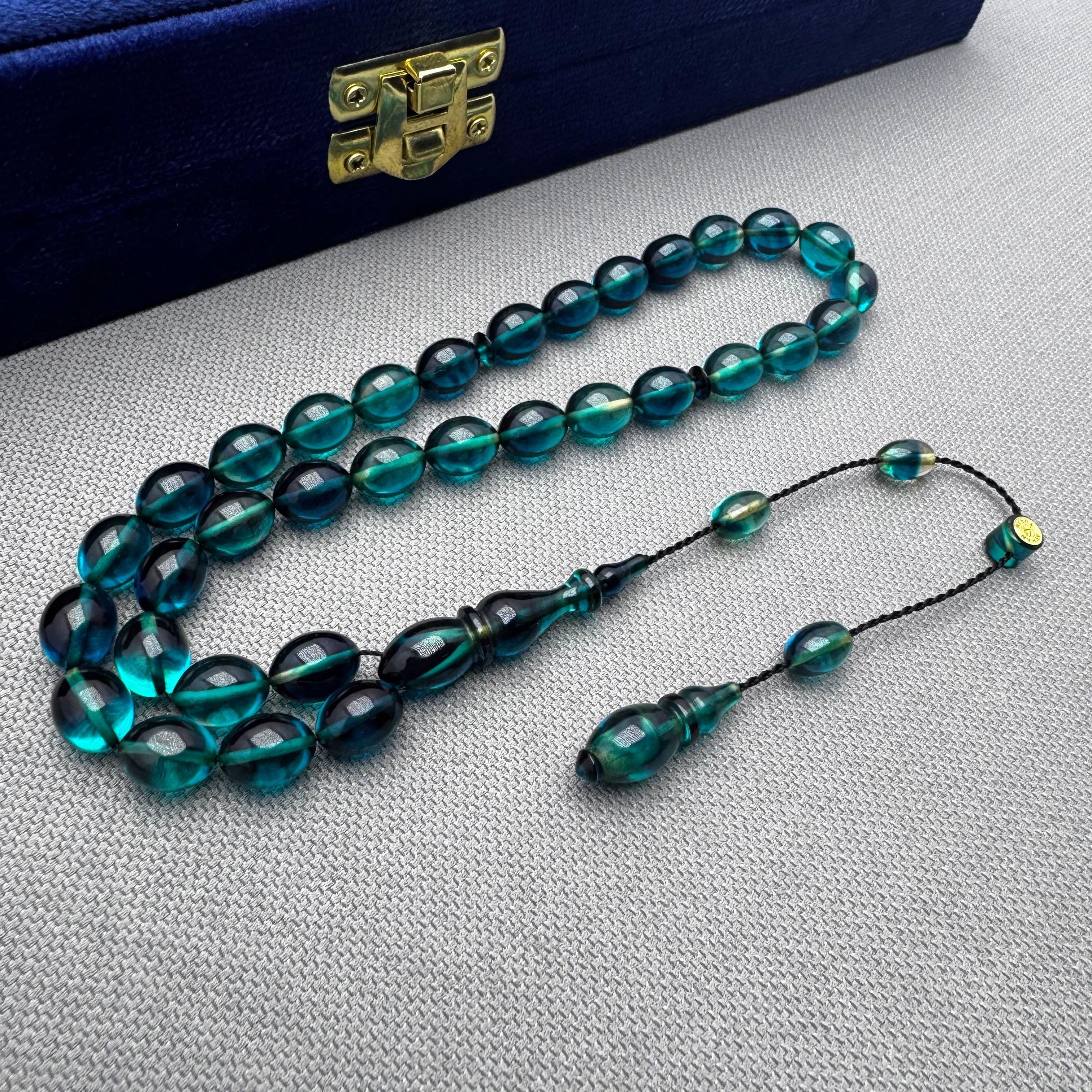 Ayhan TURAN Usta İşçilikli Petrol Mavisi Hareli Beyzi Kesim Ateş Kehribar Tespih