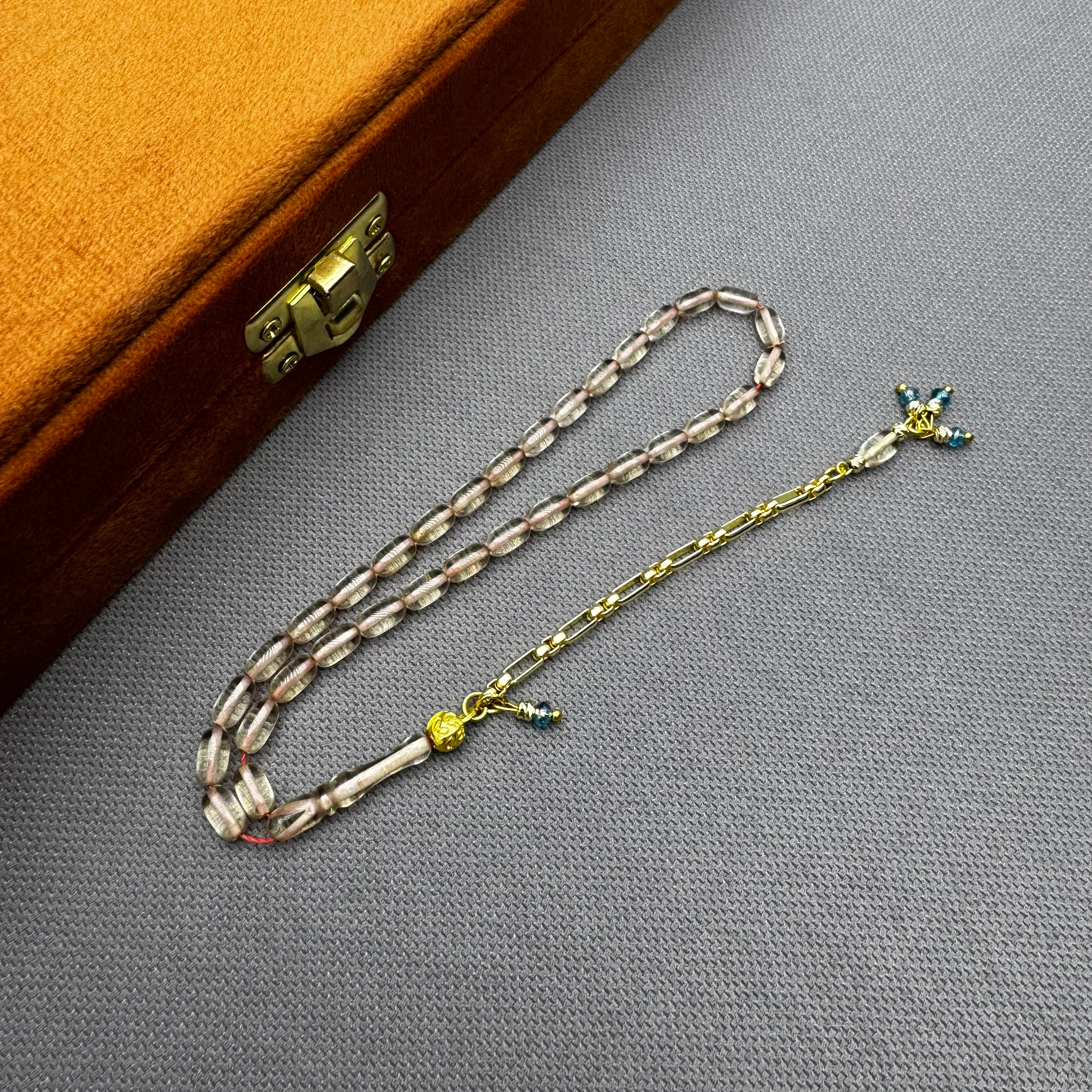 Özel Dizayn Pirinç Püsküllü Şeffaf Bilek Boy Sıkma Kehribar Tespih