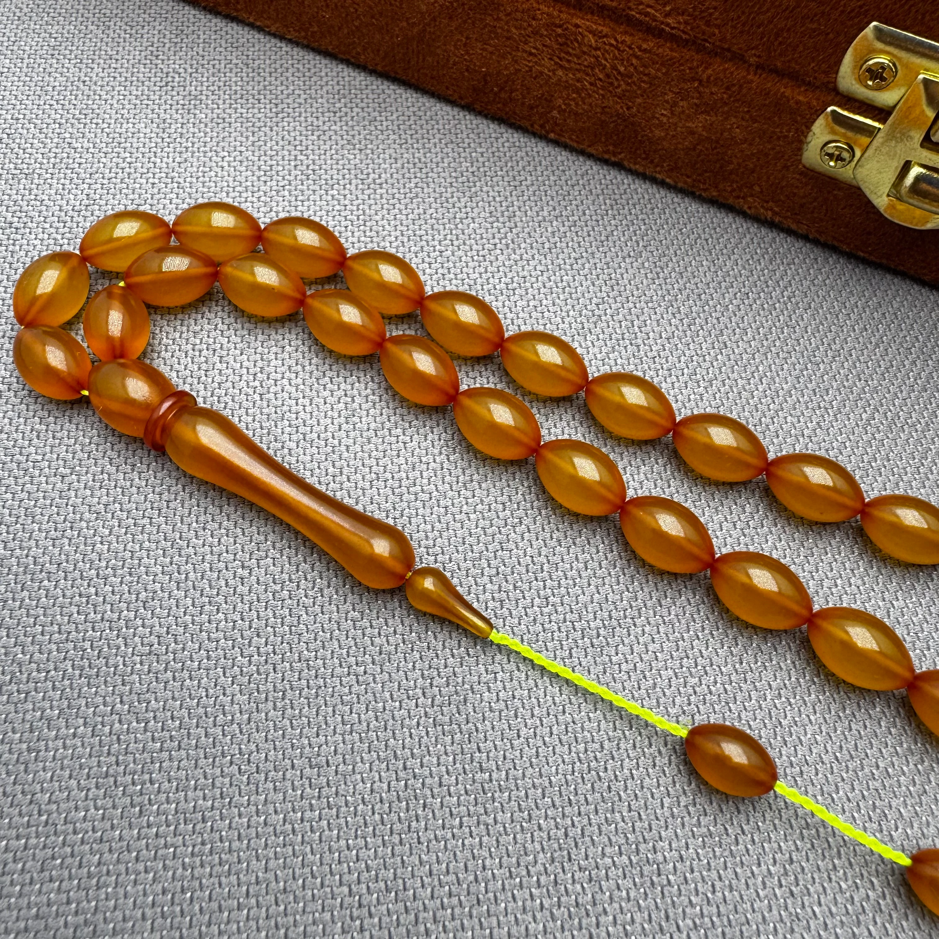 Burak ÖZECİK Usta İşçilikli Turuncu Buğulu Hamur Renk Alan Sıkma Kehribar Tespih