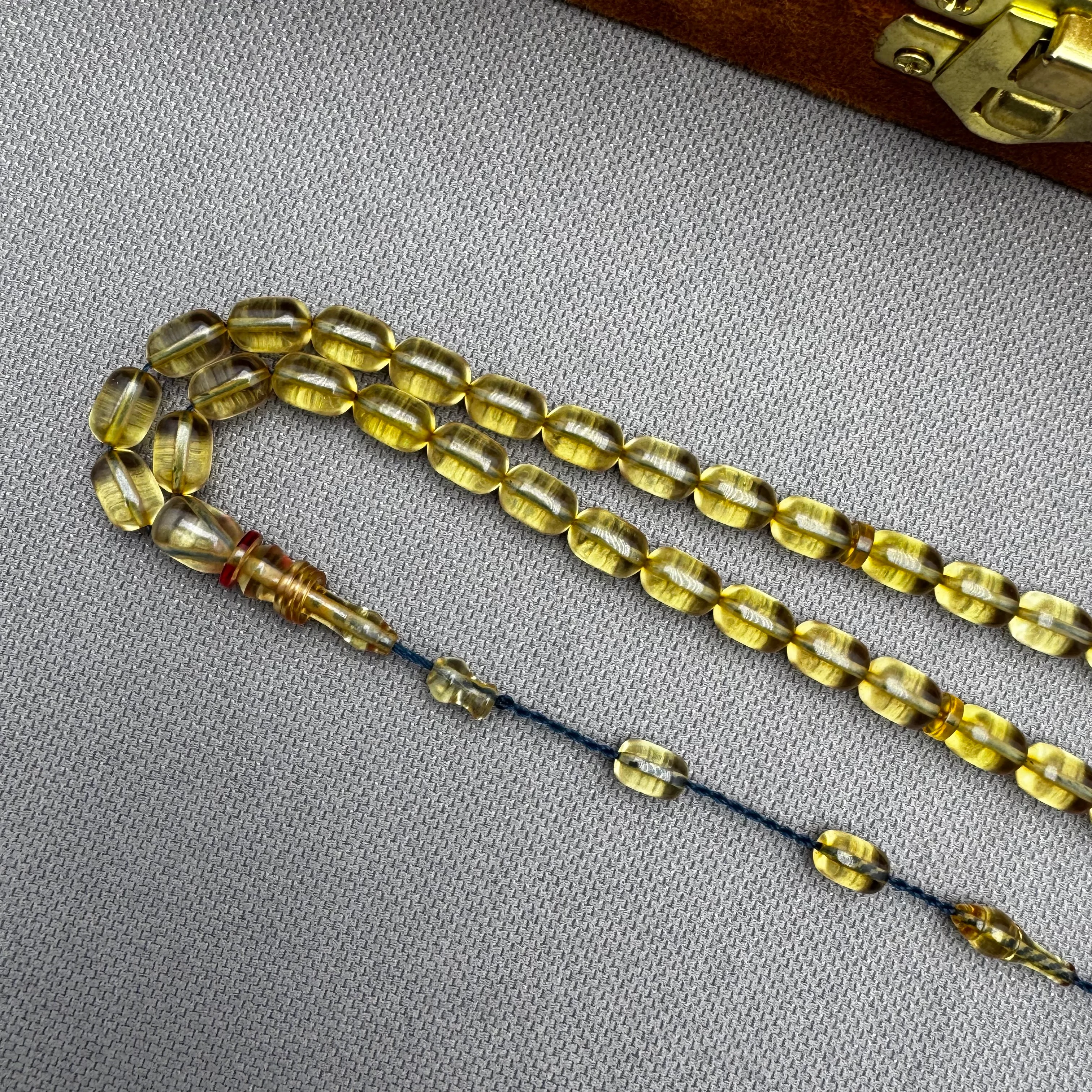 Salih ŞİRİN Usta İşçilikli Halkalı İmame Bilek Boy Şeffaf Kapsül Kesim Ateş Kehribar Tespih