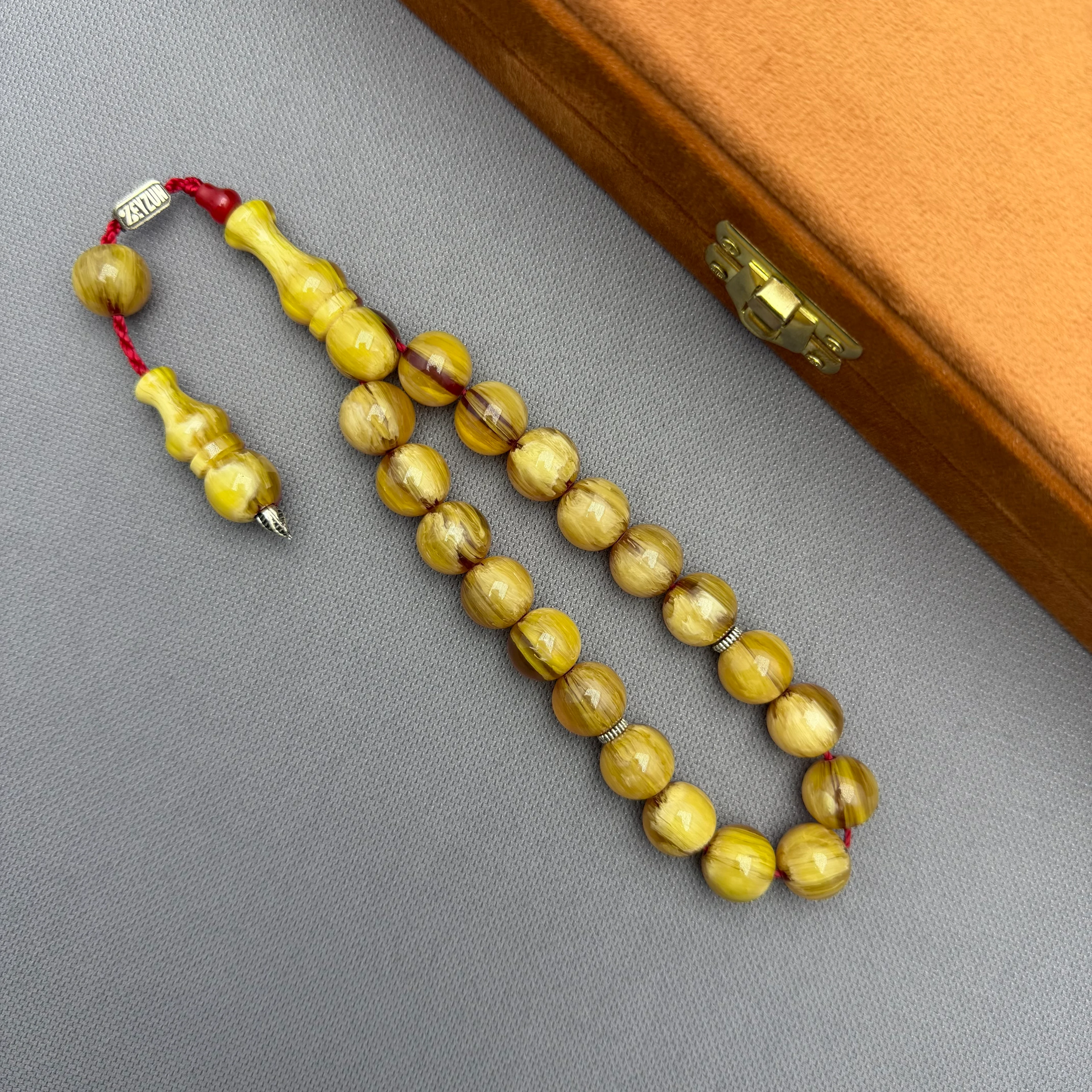 Zeyzun Usta İşçilikli Sarı Şeffaf Hareli Küre Kesim Efe Maskot Sıkma Kehribar Tespih