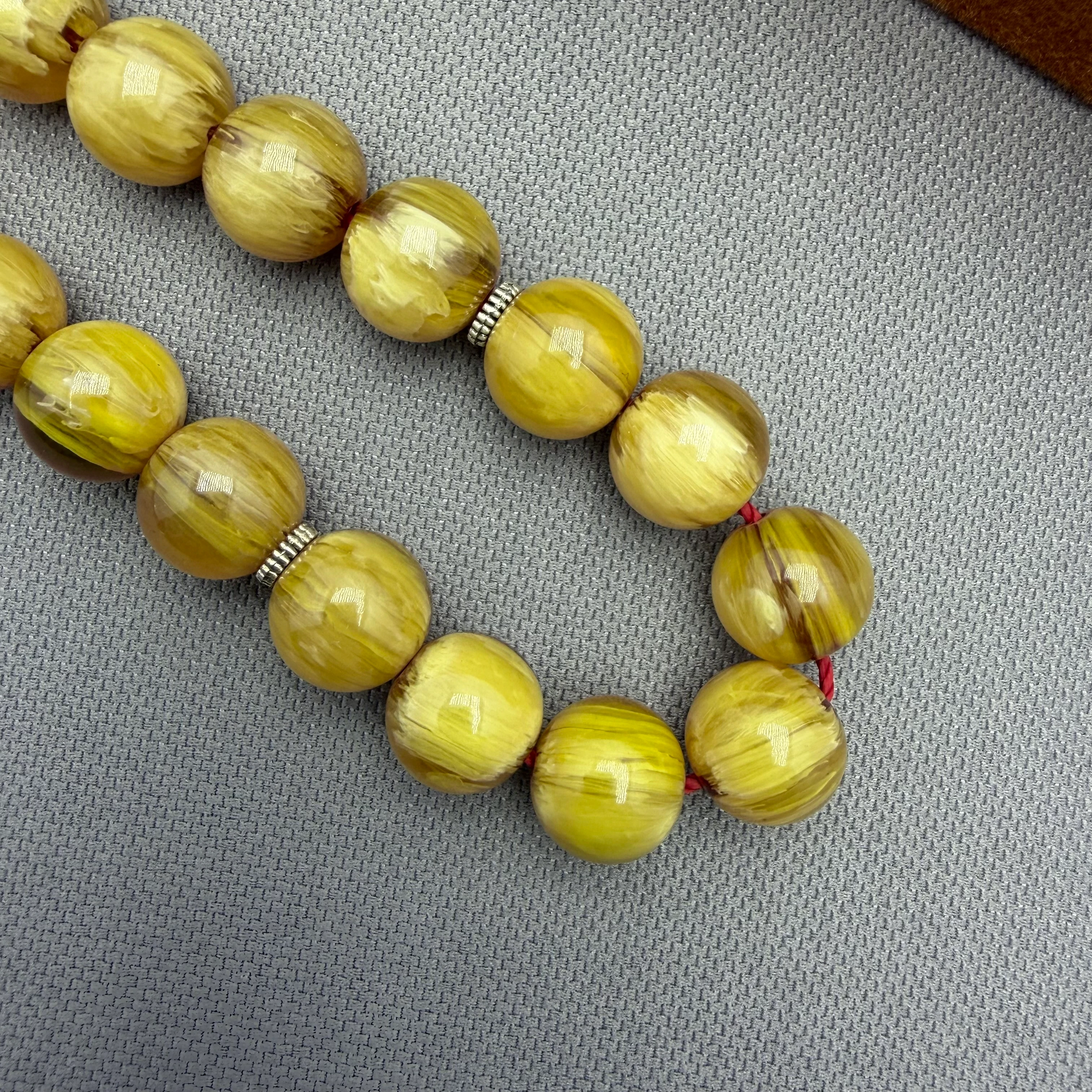 Zeyzun Usta İşçilikli Sarı Şeffaf Hareli Küre Kesim Efe Maskot Sıkma Kehribar Tespih