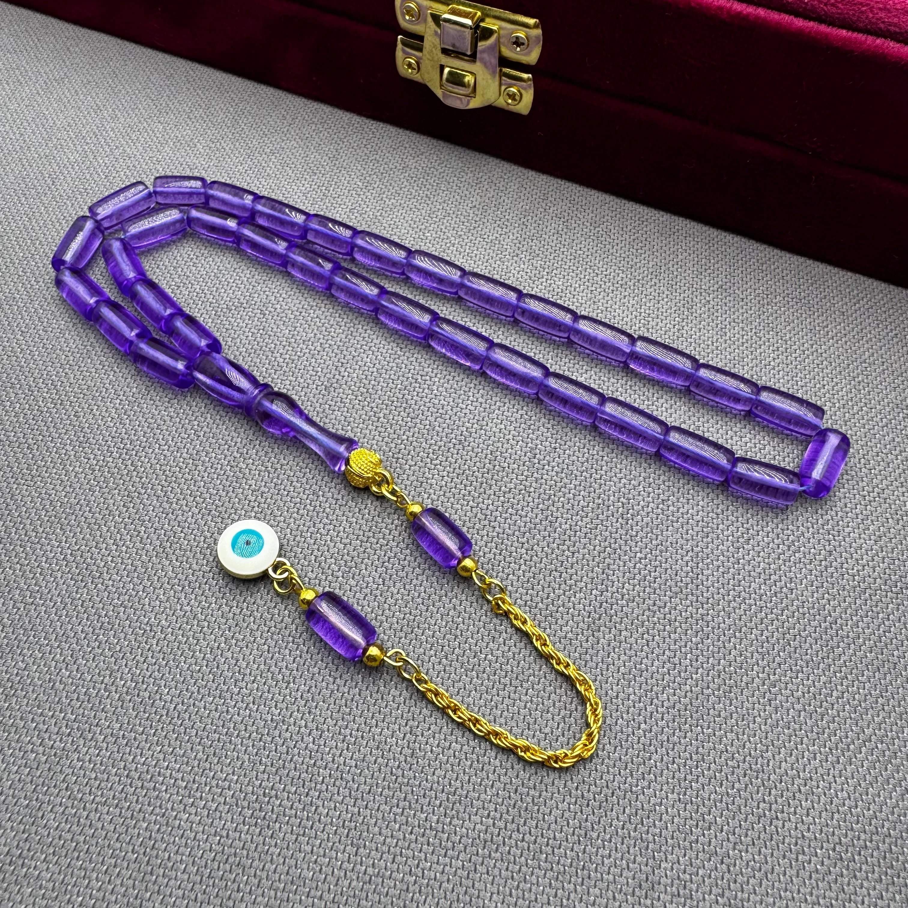 Nazar Boncuğu Detaylı Pirinç Püsküllü Bilek Boy Kapsül Kesim Lila Rengi Uçak Camı Tespih