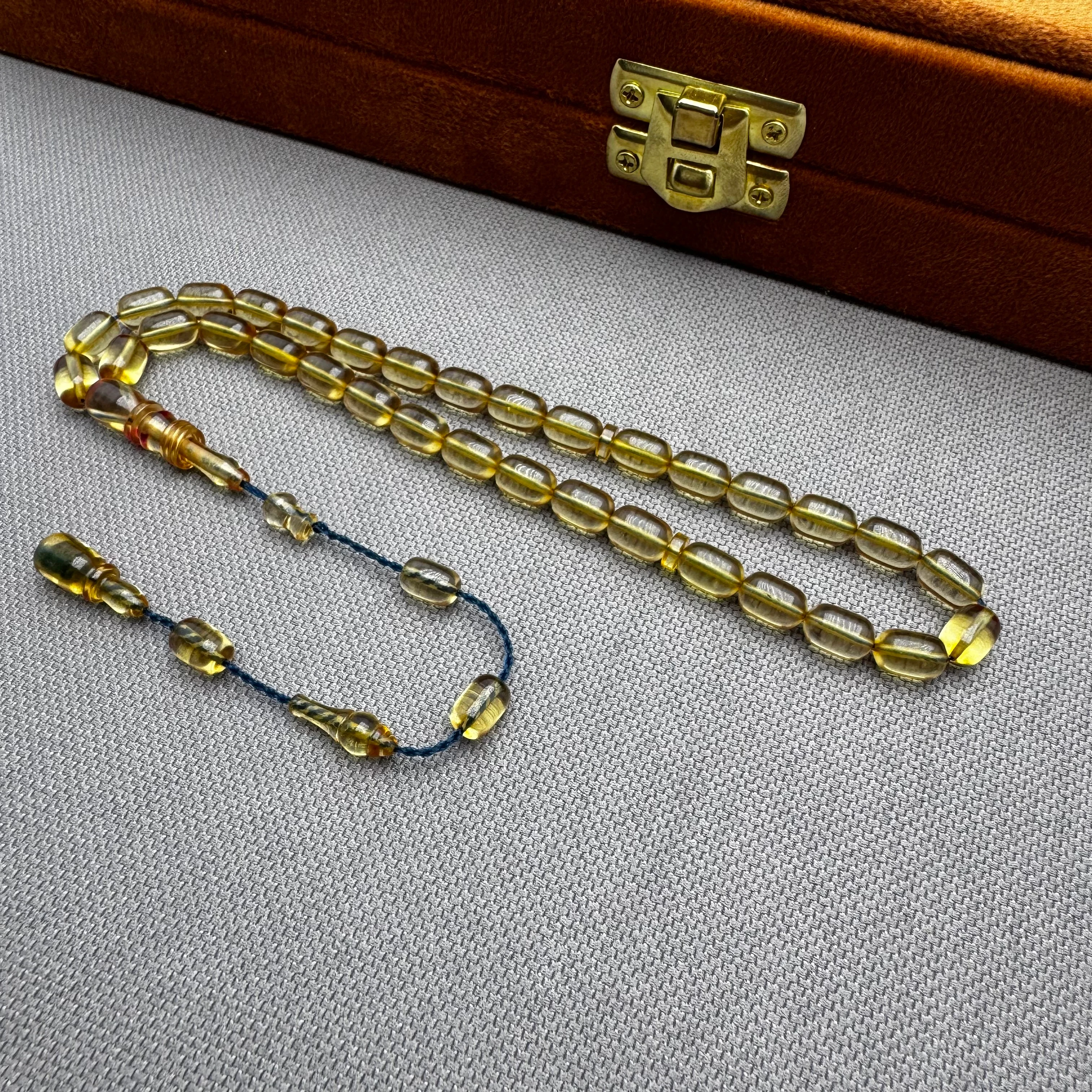 Salih ŞİRİN Usta İşçilikli Halkalı İmame Bilek Boy Şeffaf Kapsül Kesim Ateş Kehribar Tespih