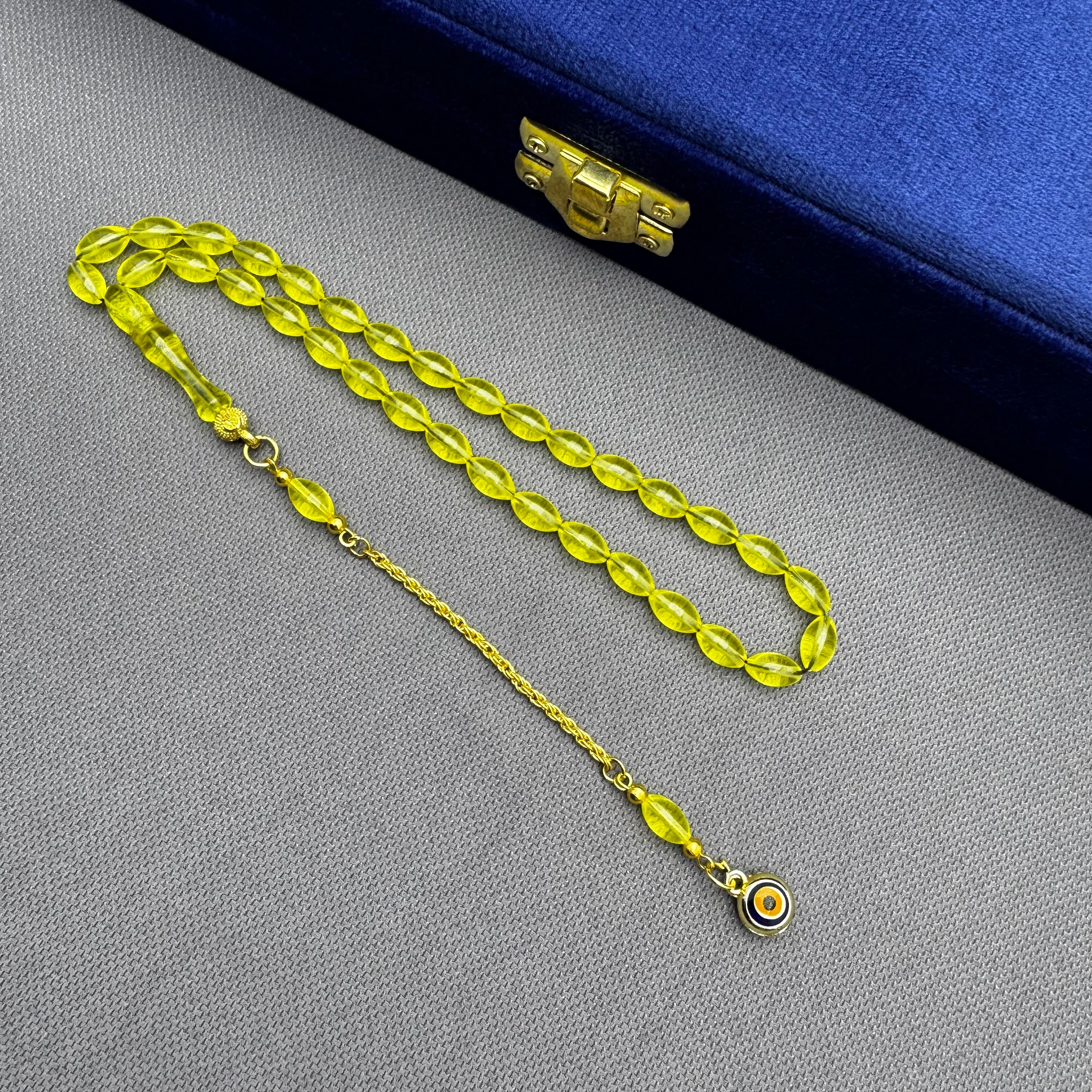 Nazar Boncuğu Detaylı Pirinç Püsküllü Bilek Boy Sarı Uçak Camı Tespih