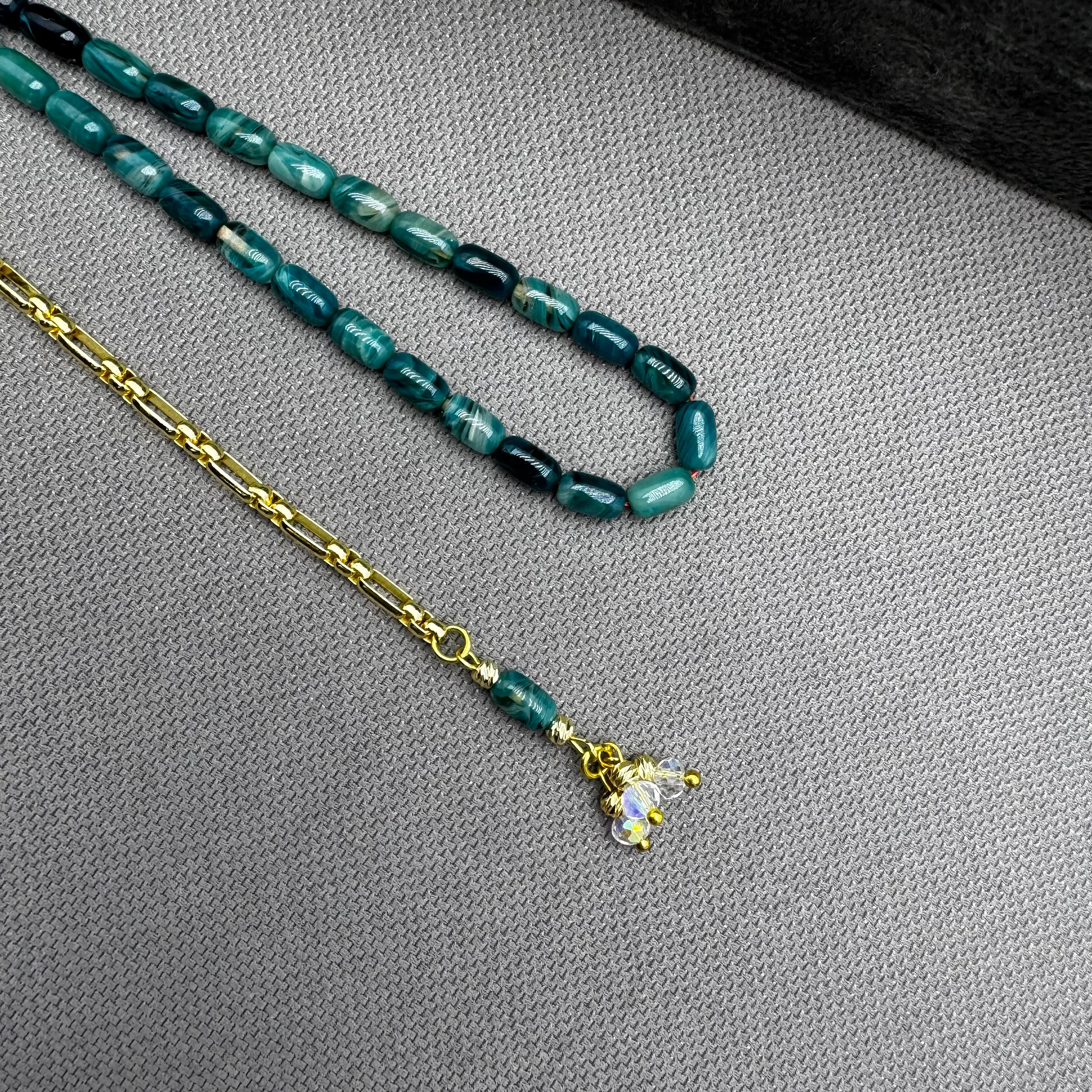 Özel Dizayn Pirinç Püsküllü Okyanus Mavi Hareli Bilek Boy Kehribar Tespih