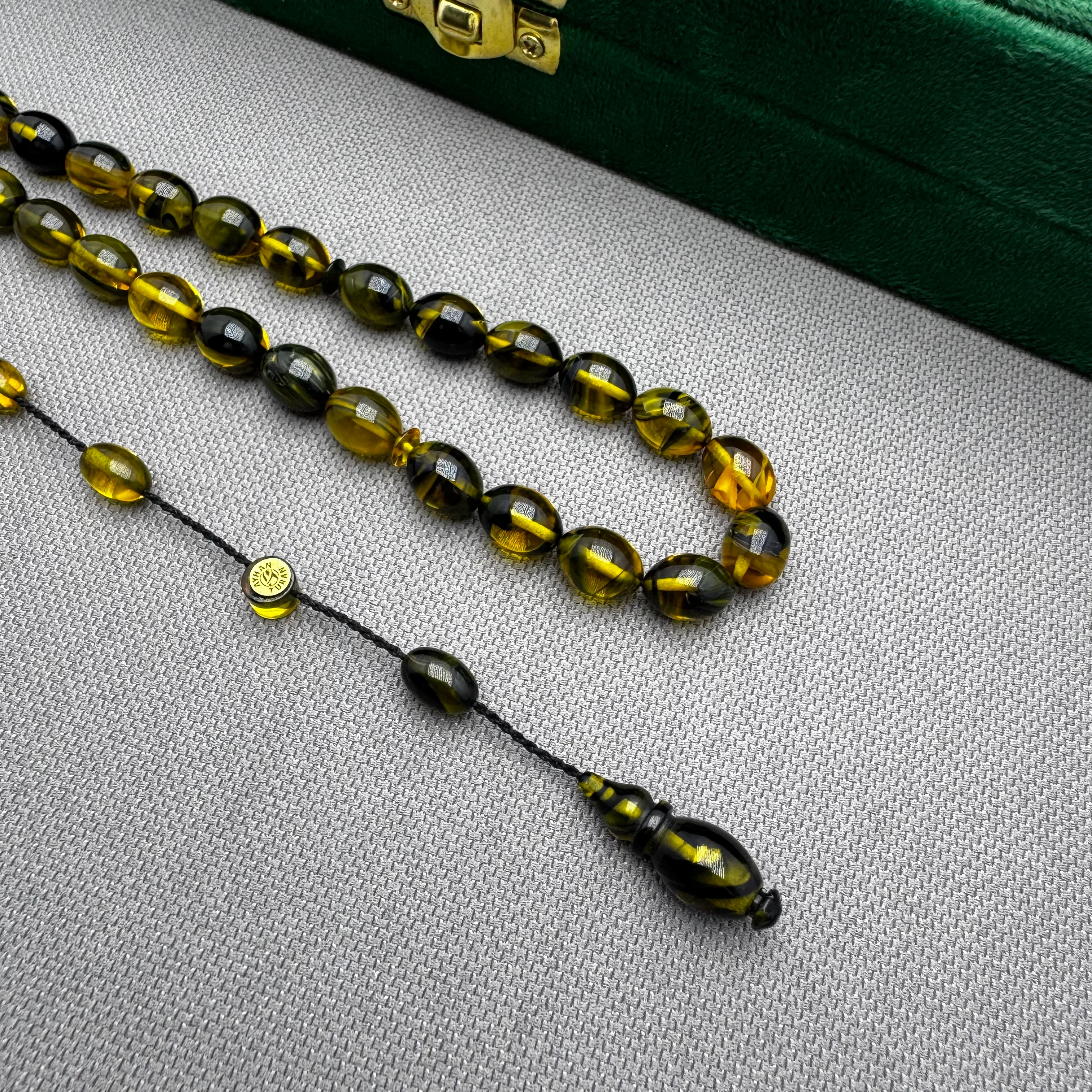 Ayhan TURAN Usta İşçilikli Haki Yoğun Hareli Beyzi Kesim Ateş Kehribar Tespih