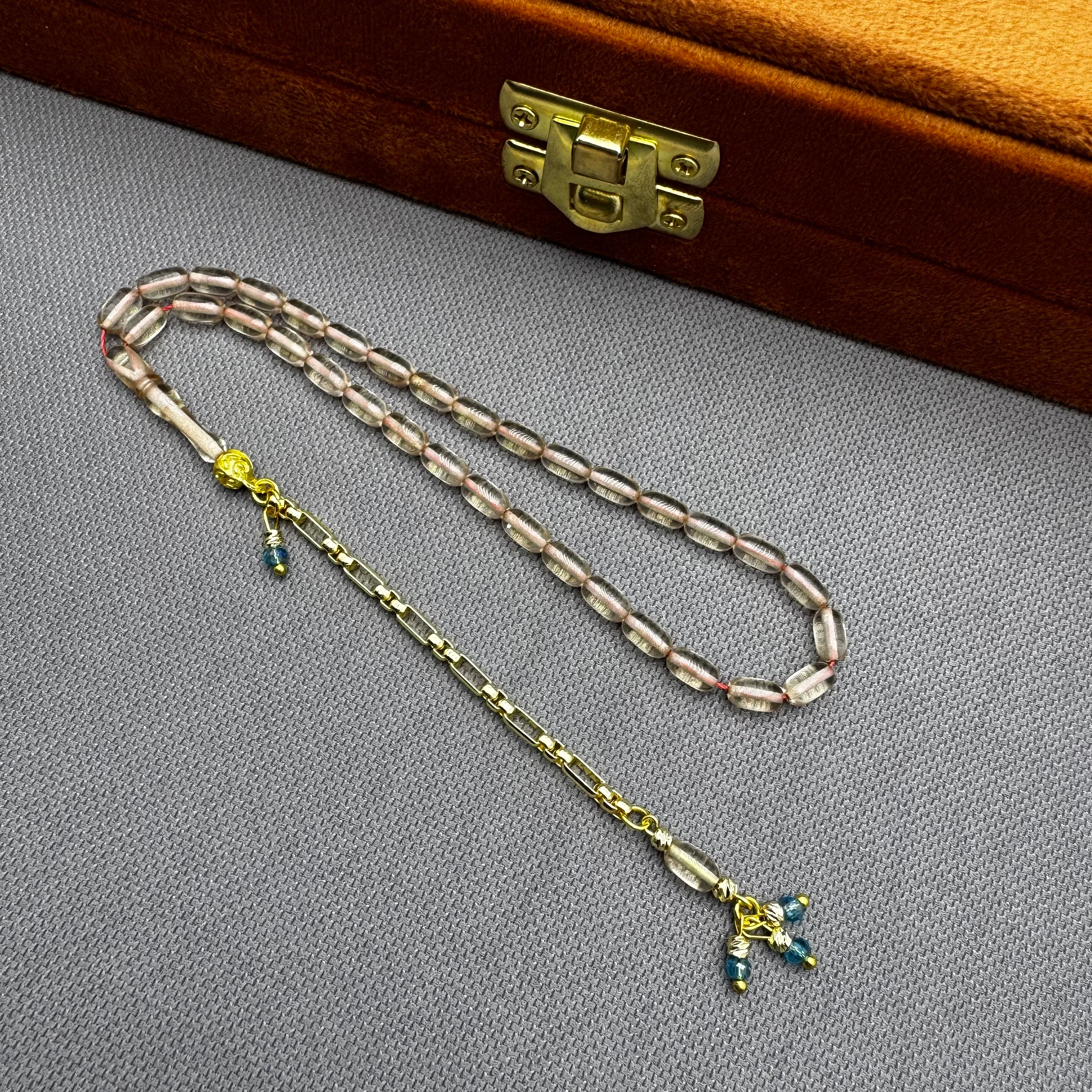 Özel Dizayn Pirinç Püsküllü Şeffaf Bilek Boy Sıkma Kehribar Tespih