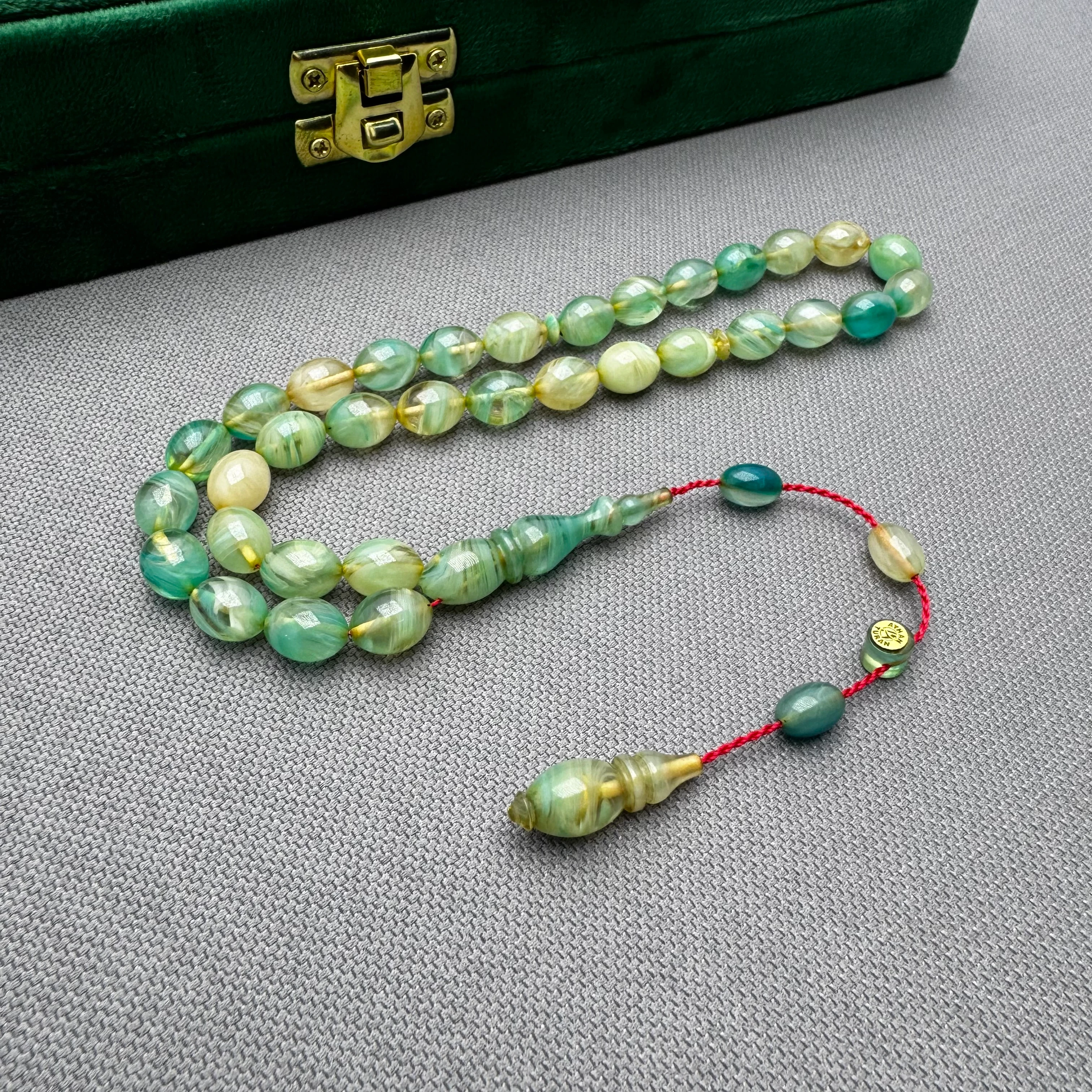 Ayhan TURAN Usta İşçilikli Yeşil Beyzi Kesim Yoğun Hareli Ateş Kehribar Tespih