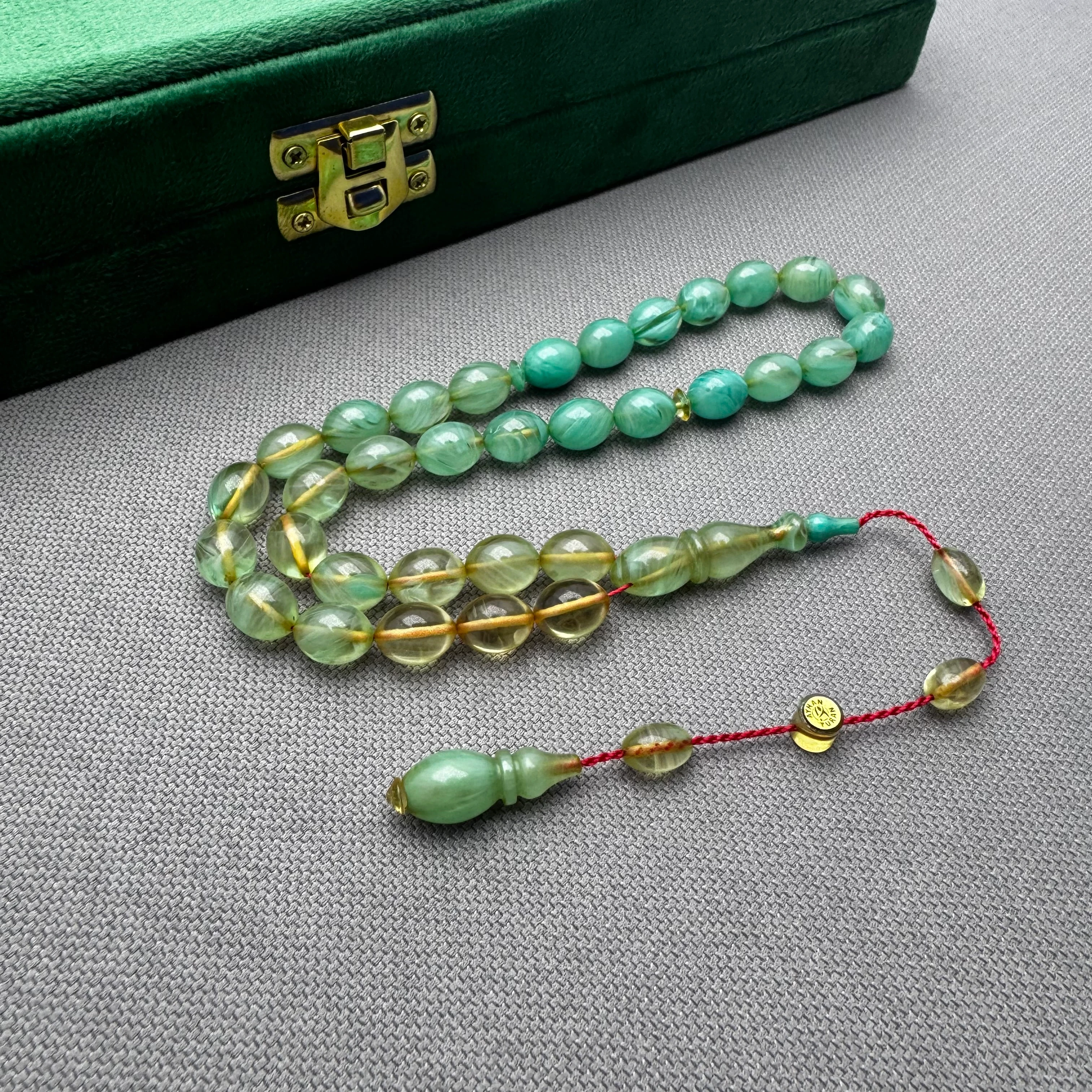 Ayhan TURAN Usta İşçilikli Mint Yeşili Beyzi Kesim Yoğun Hareli Ateş Kehribar Tespih