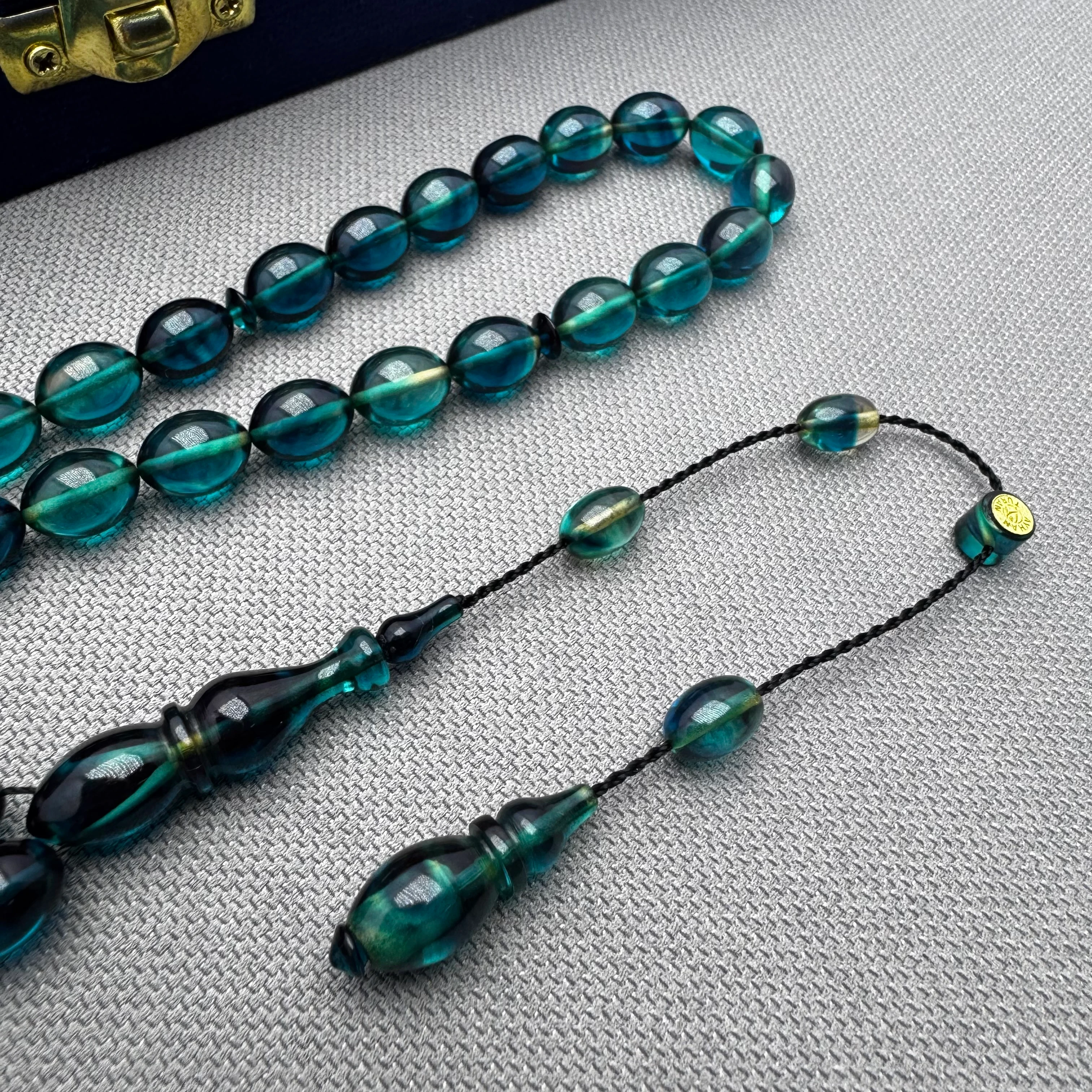 Ayhan TURAN Usta İşçilikli Petrol Mavisi Hareli Beyzi Kesim Ateş Kehribar Tespih