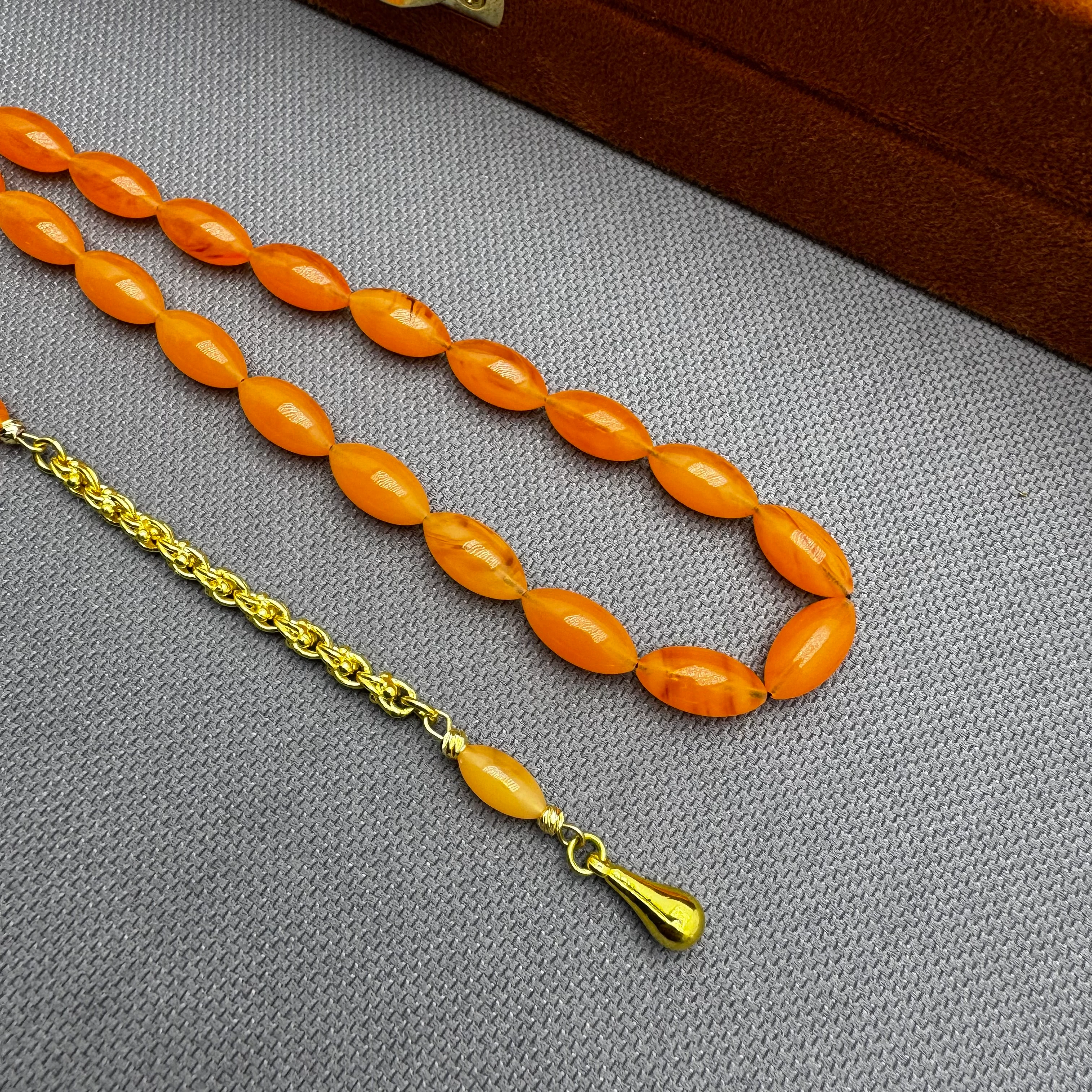 Usta İşçilikli 925 Ayar Gümüş Püsküllü Turuncu Hareli Alman Bakalit Tespih