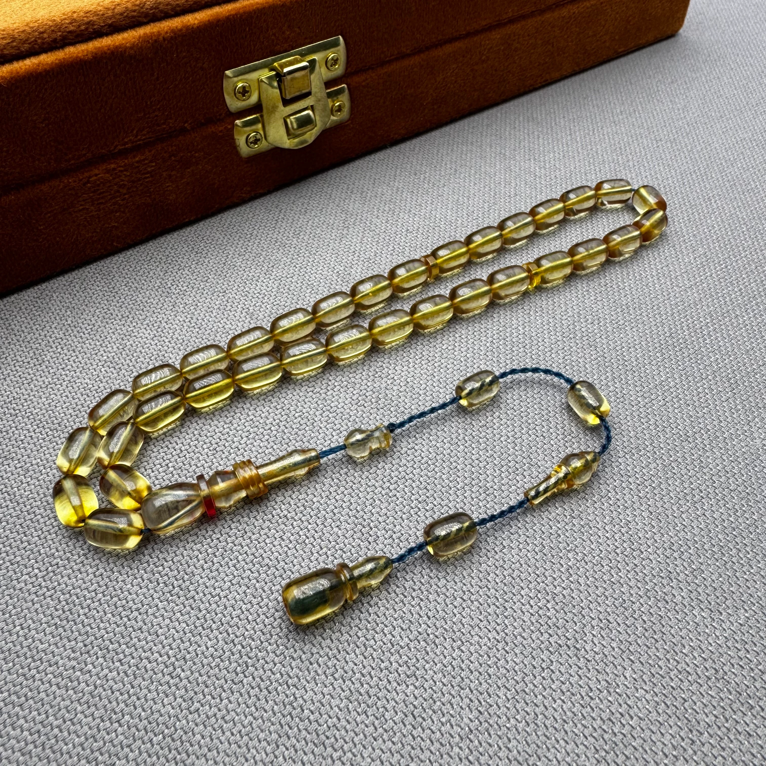 Salih ŞİRİN Usta İşçilikli Halkalı İmame Bilek Boy Şeffaf Kapsül Kesim Ateş Kehribar Tespih