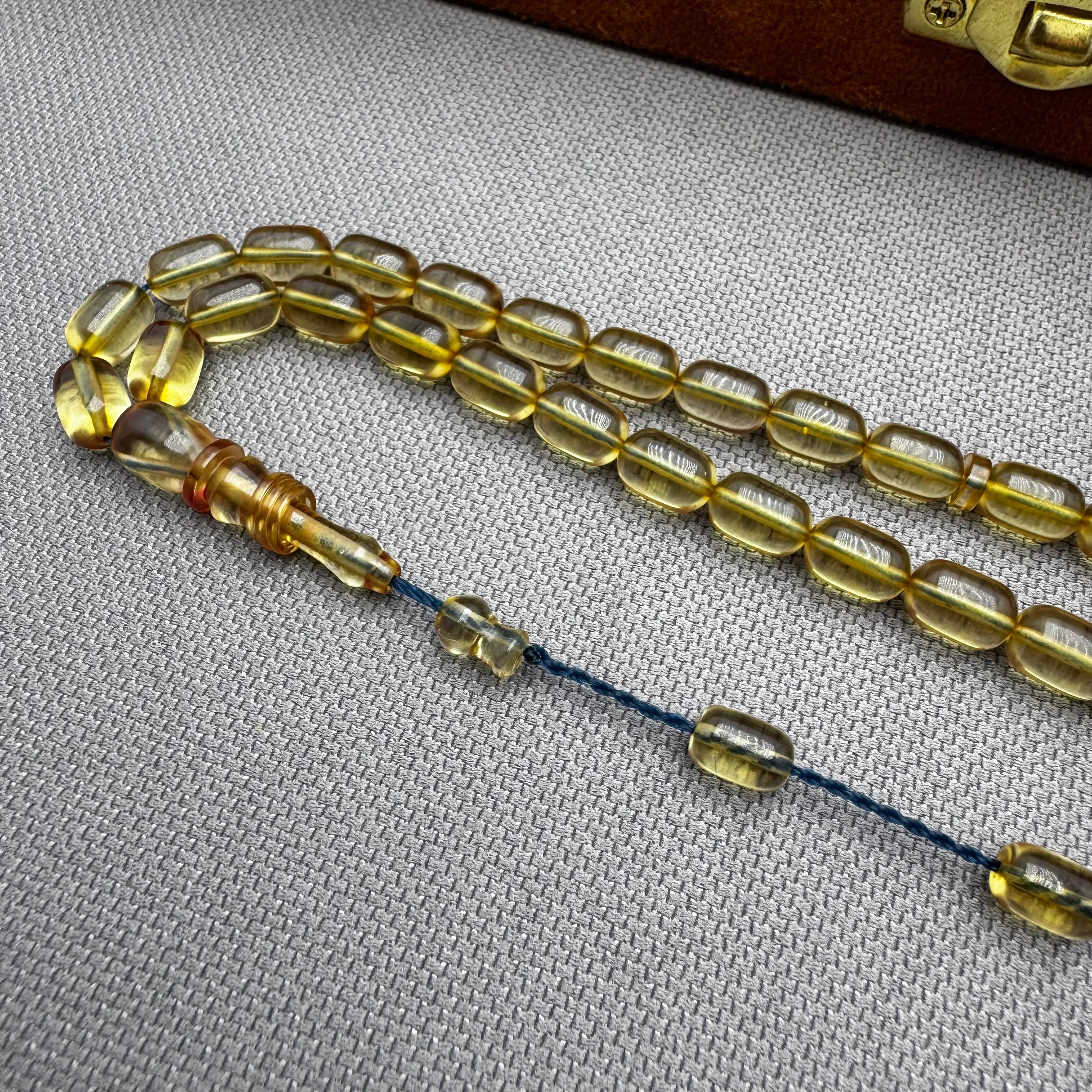 Salih ŞİRİN Usta İşçilikli Halkalı İmame Bilek Boy Şeffaf Kapsül Kesim Ateş Kehribar Tespih