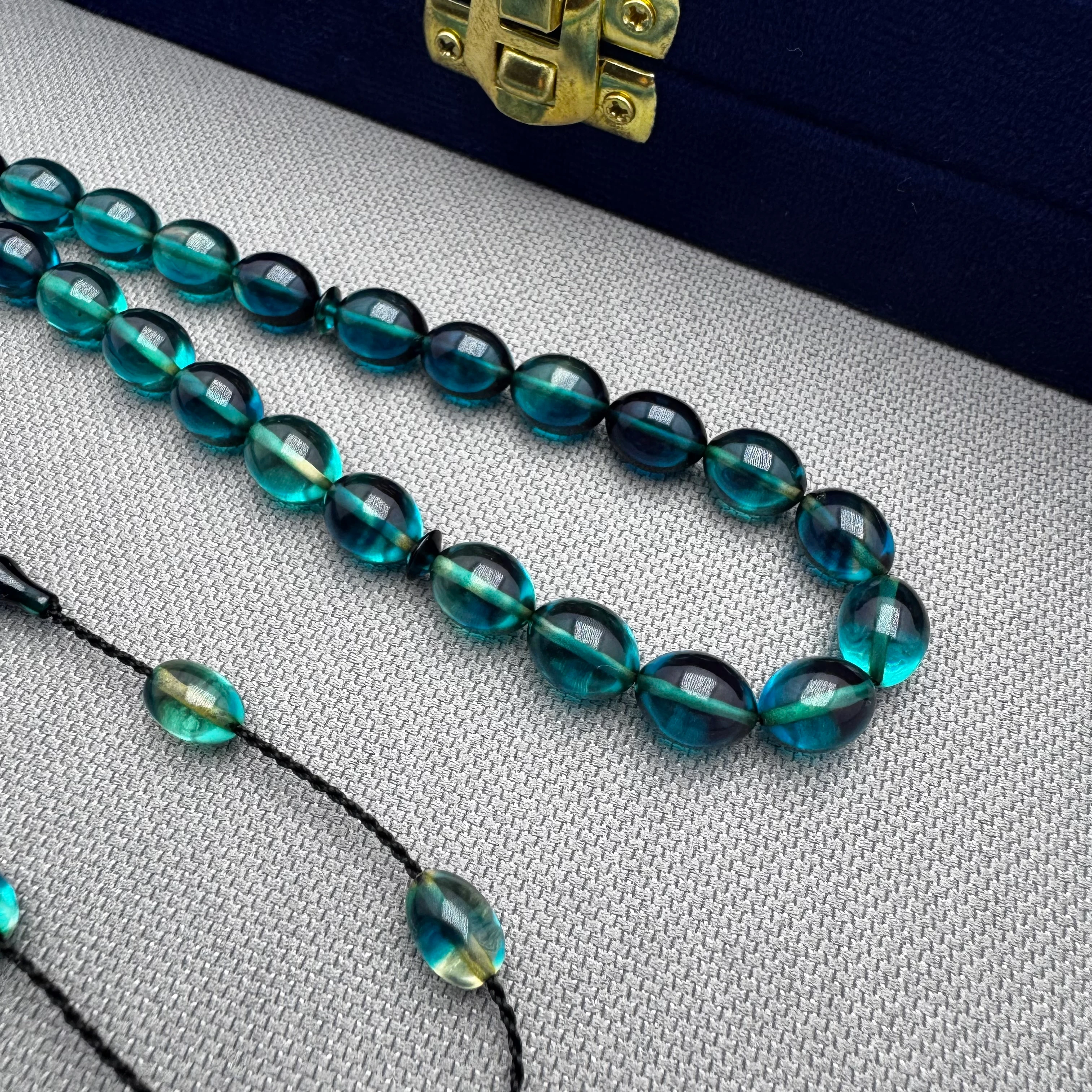 Ayhan TURAN Usta İşçilikli Petrol Mavisi Hareli Beyzi Kesim Ateş Kehribar Tespih