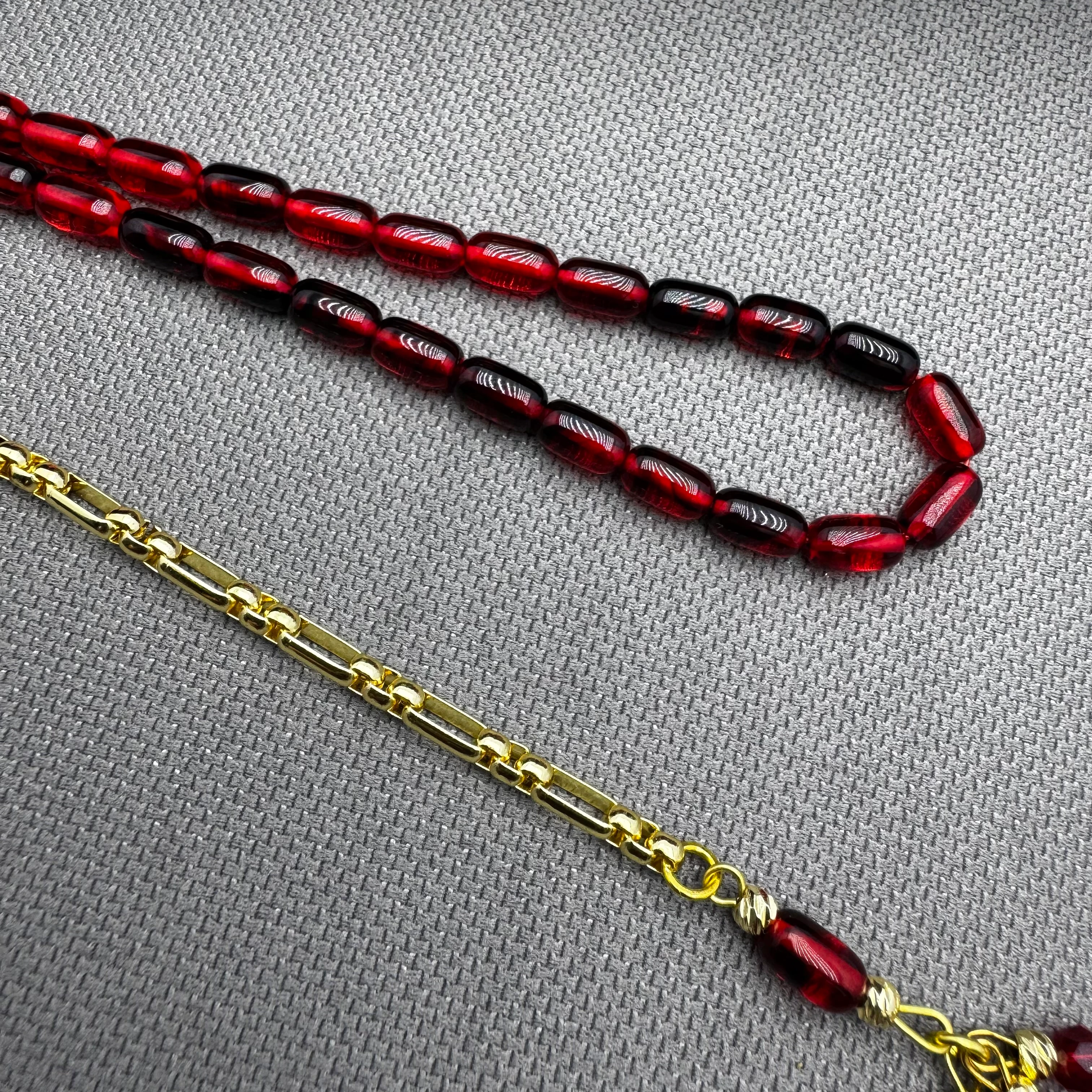 Özel Dizayn Pirinç Püsküllü Kırmızı Hareli Bilek Boy Ateş Kehribar Tespih