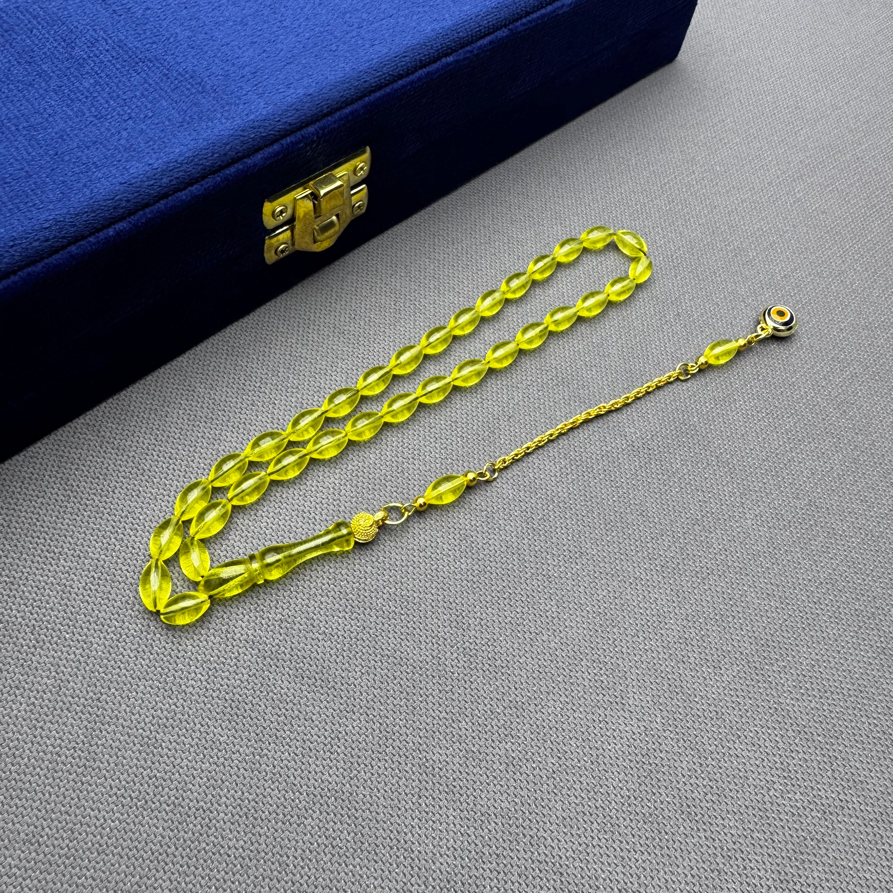 Nazar Boncuğu Detaylı Pirinç Püsküllü Bilek Boy Sarı Uçak Camı Tespih