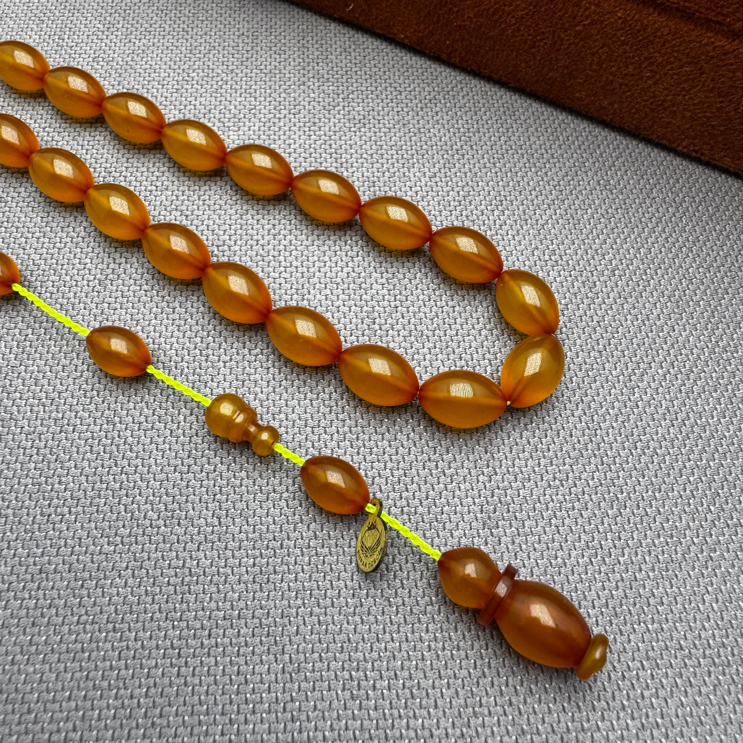 Burak ÖZECİK Usta İşçilikli Turuncu Buğulu Hamur Renk Alan Sıkma Kehribar Tespih