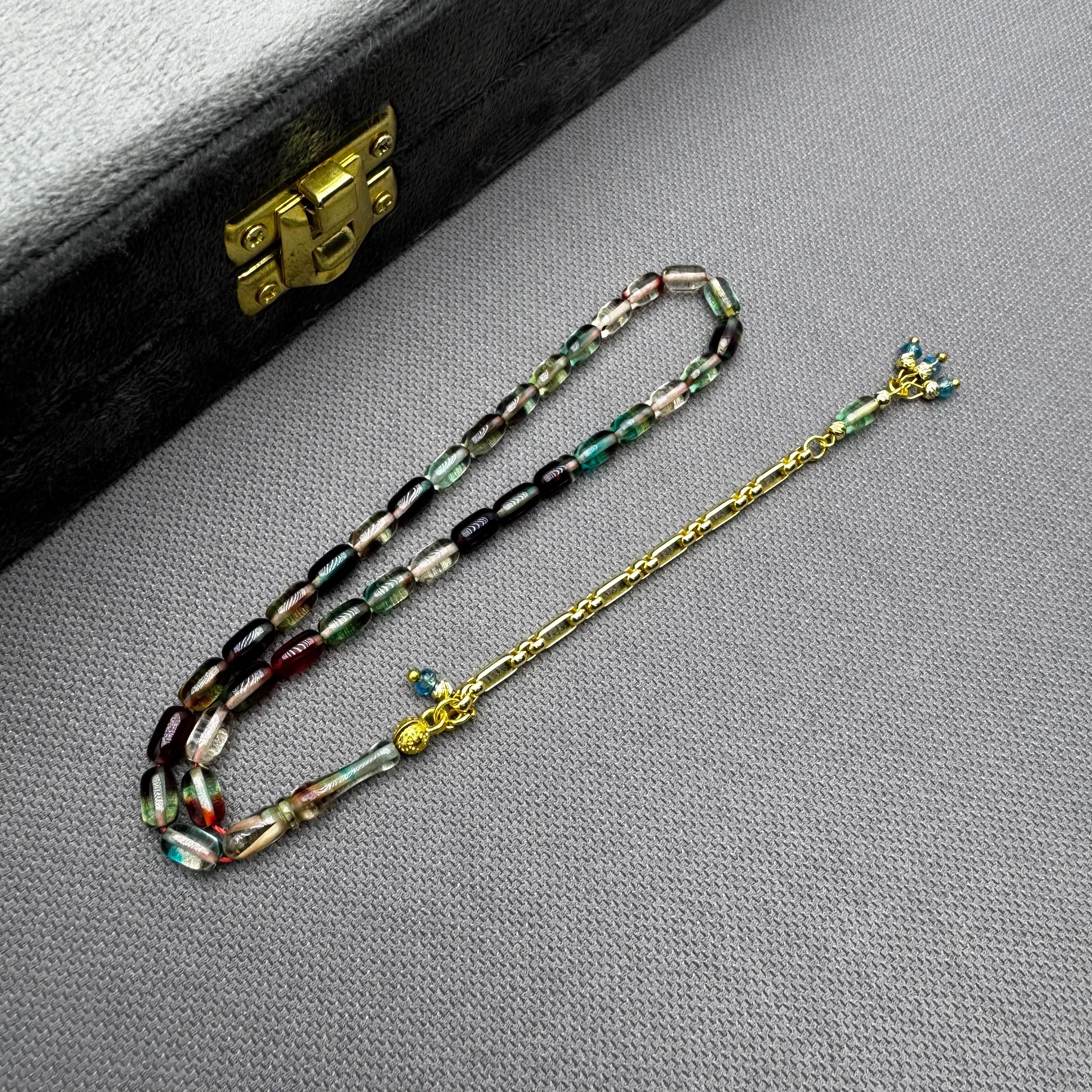 Özel Dizayn Pirinç Püsküllü Renk Süzmesi Hareli Bilek Boy Kehribar Tespih