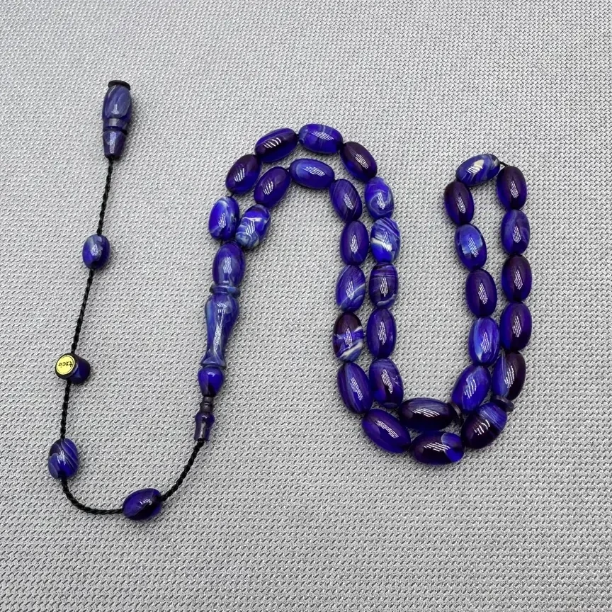 Muhammed TACİR Usta İşçilikli Mavi Hareli Sıkma Kehribar Tespih