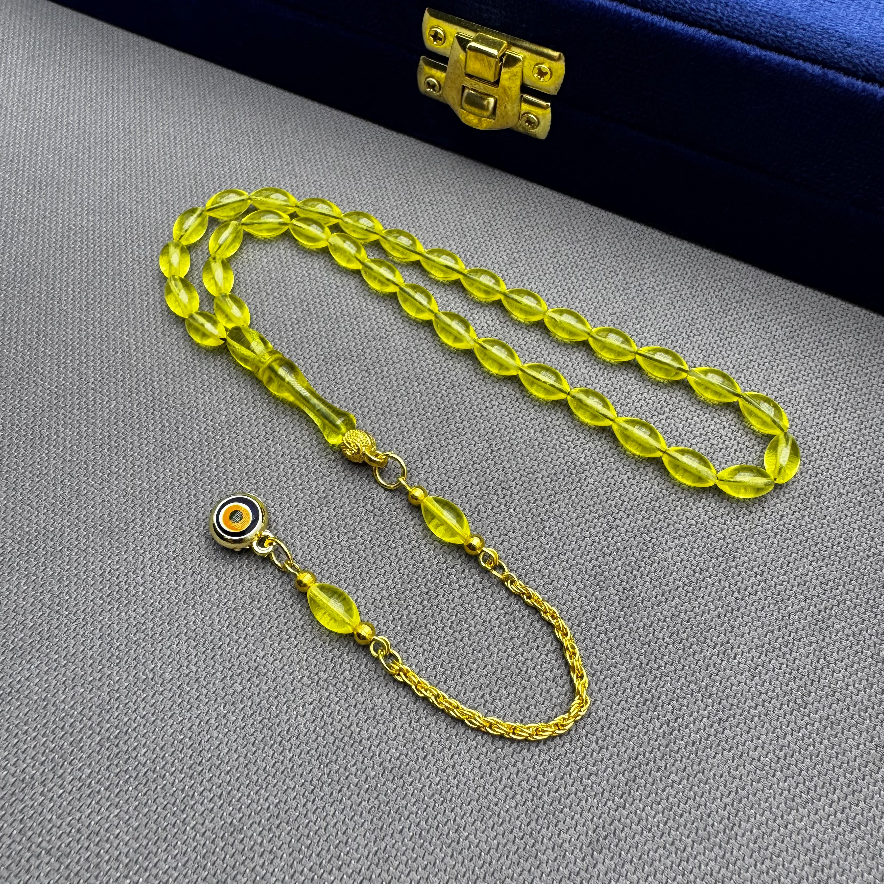 Nazar Boncuğu Detaylı Pirinç Püsküllü Bilek Boy Sarı Uçak Camı Tespih