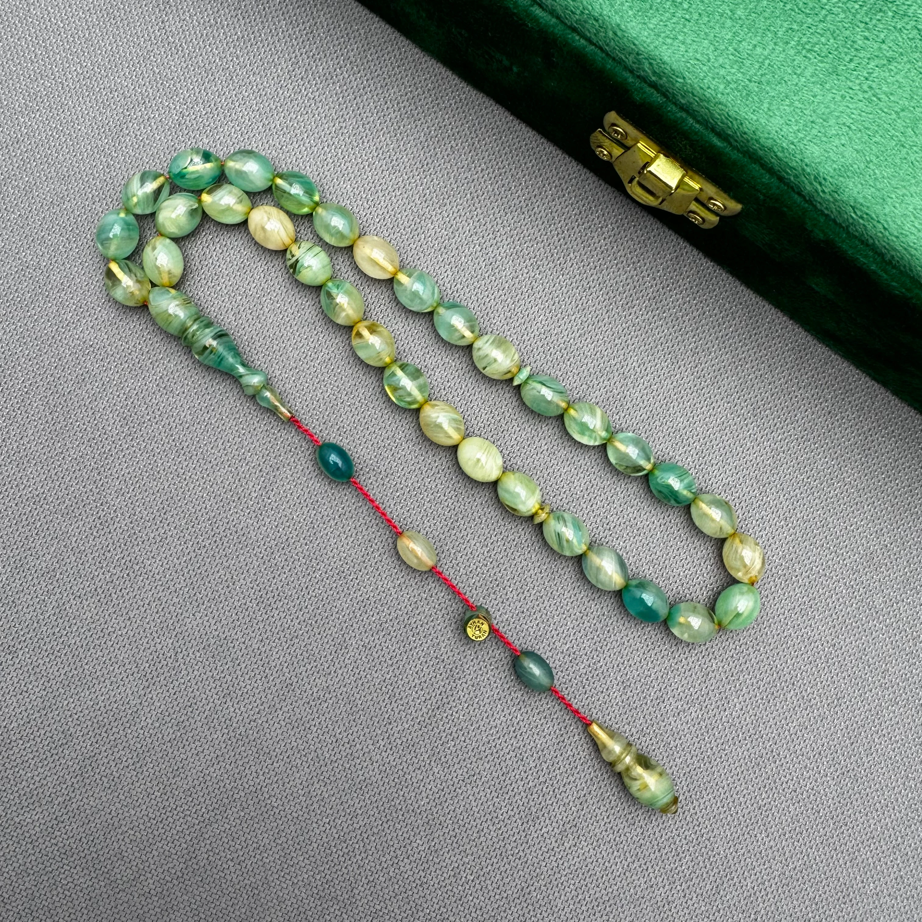 Ayhan TURAN Usta İşçilikli Yeşil Beyzi Kesim Yoğun Hareli Ateş Kehribar Tespih