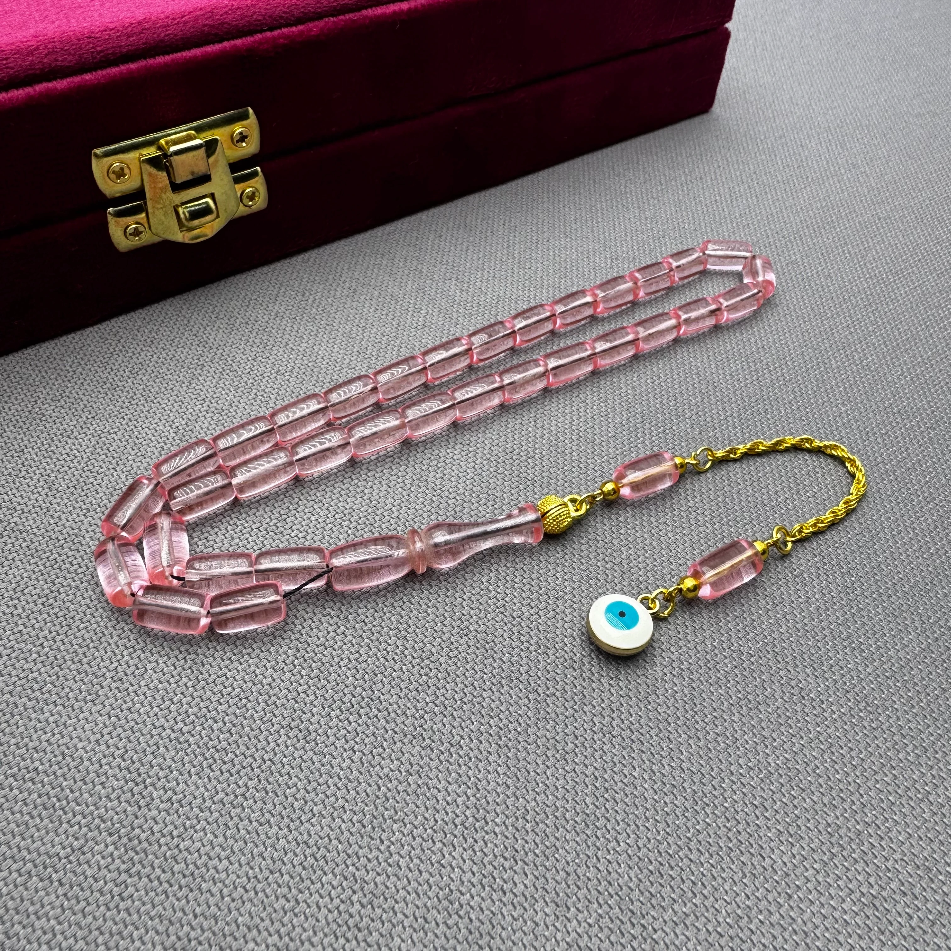 Nazar Boncuğu Detaylı Pirinç Püsküllü Bilek Boy Kapsül Kesim Pembe Uçak Camı Tespih