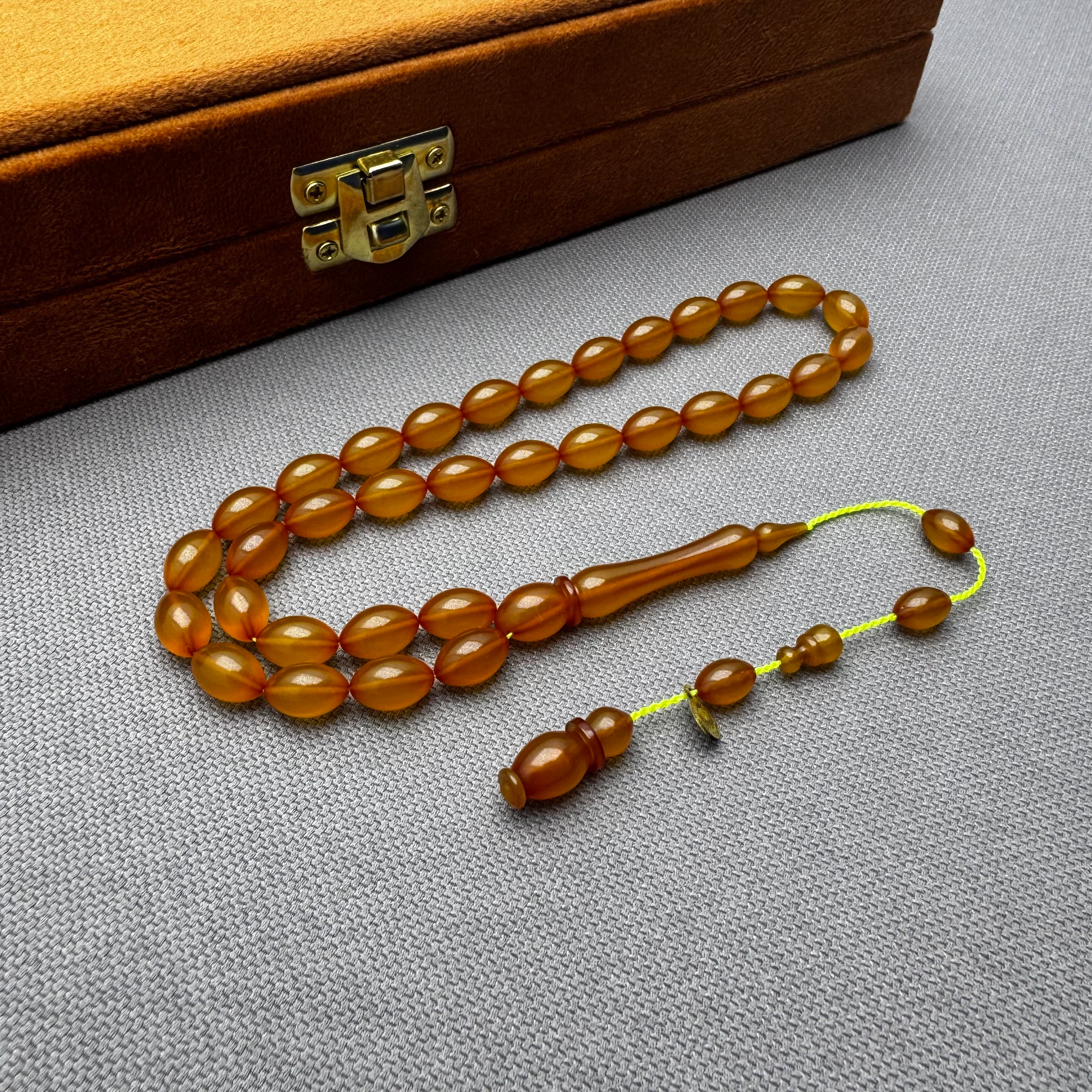 Burak ÖZECİK Usta İşçilikli Turuncu Buğulu Hamur Renk Alan Sıkma Kehribar Tespih