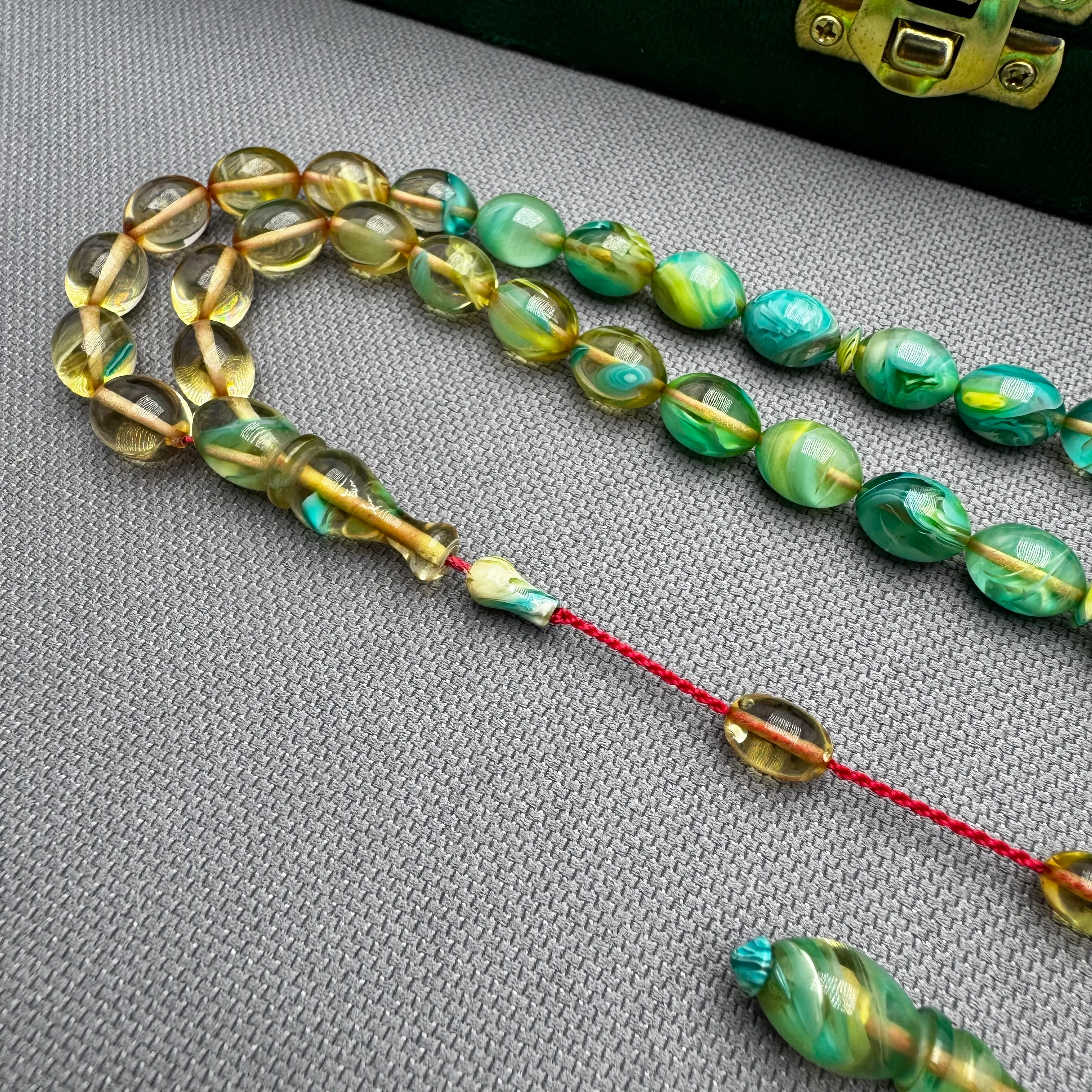 Ayhan TURAN Usta İşçilikli Şeffaf Turkuaz Renk Süzmeli Beyzi Kesim Yoğun Hareli Ateş Kehribar Tespih