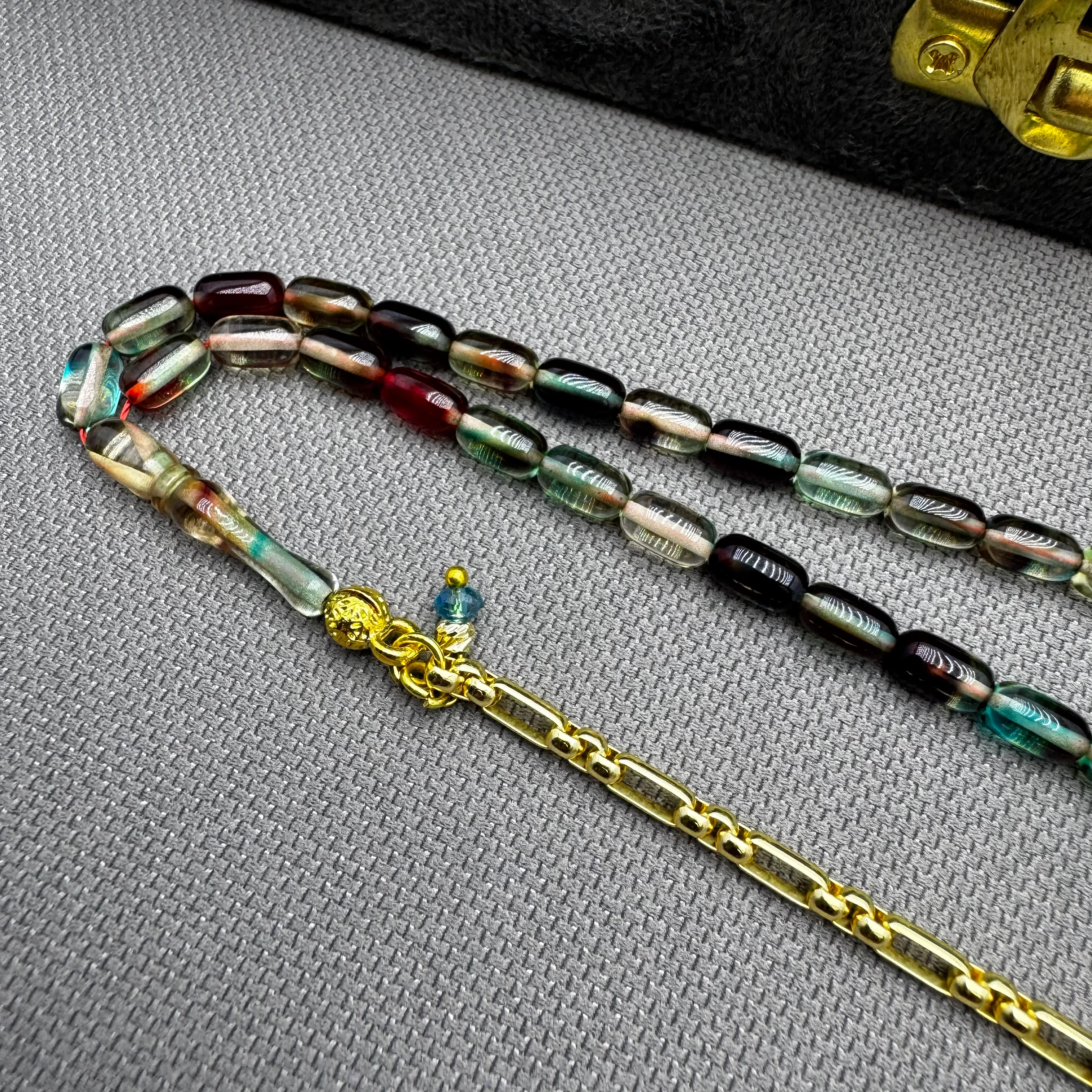 Özel Dizayn Pirinç Püsküllü Renk Süzmesi Hareli Bilek Boy Kehribar Tespih