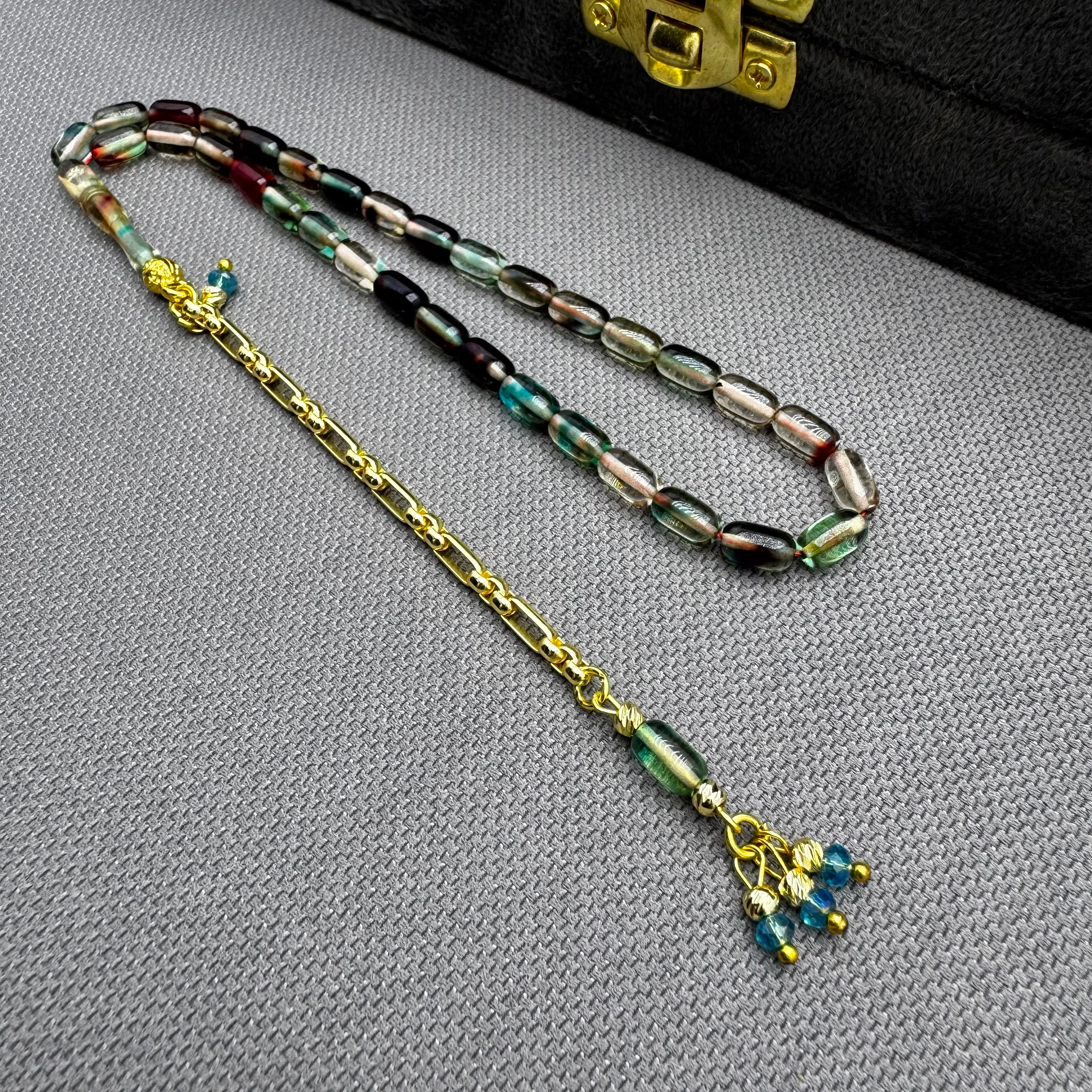 Özel Dizayn Pirinç Püsküllü Renk Süzmesi Hareli Bilek Boy Kehribar Tespih