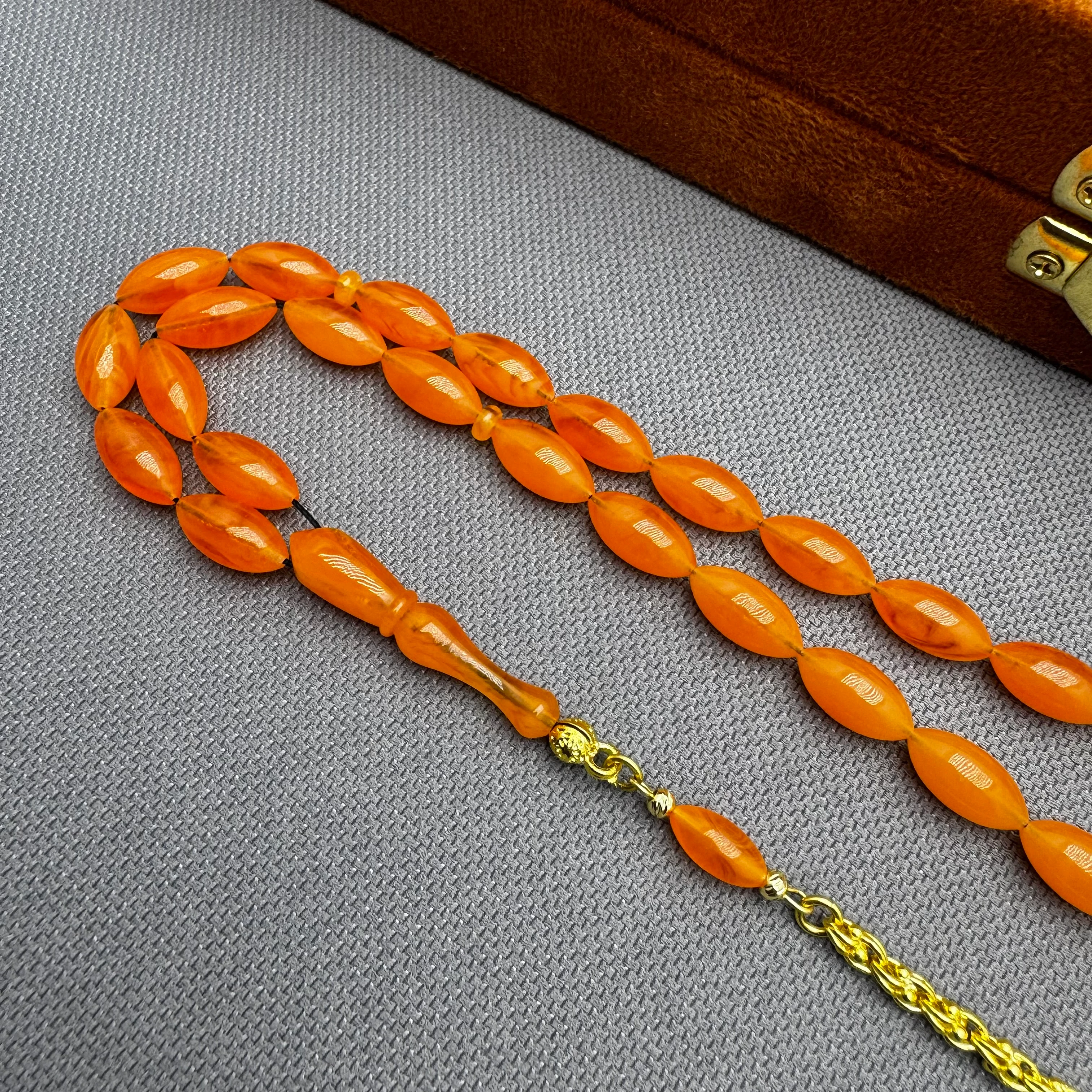 Usta İşçilikli 925 Ayar Gümüş Püsküllü Turuncu Hareli Alman Bakalit Tespih