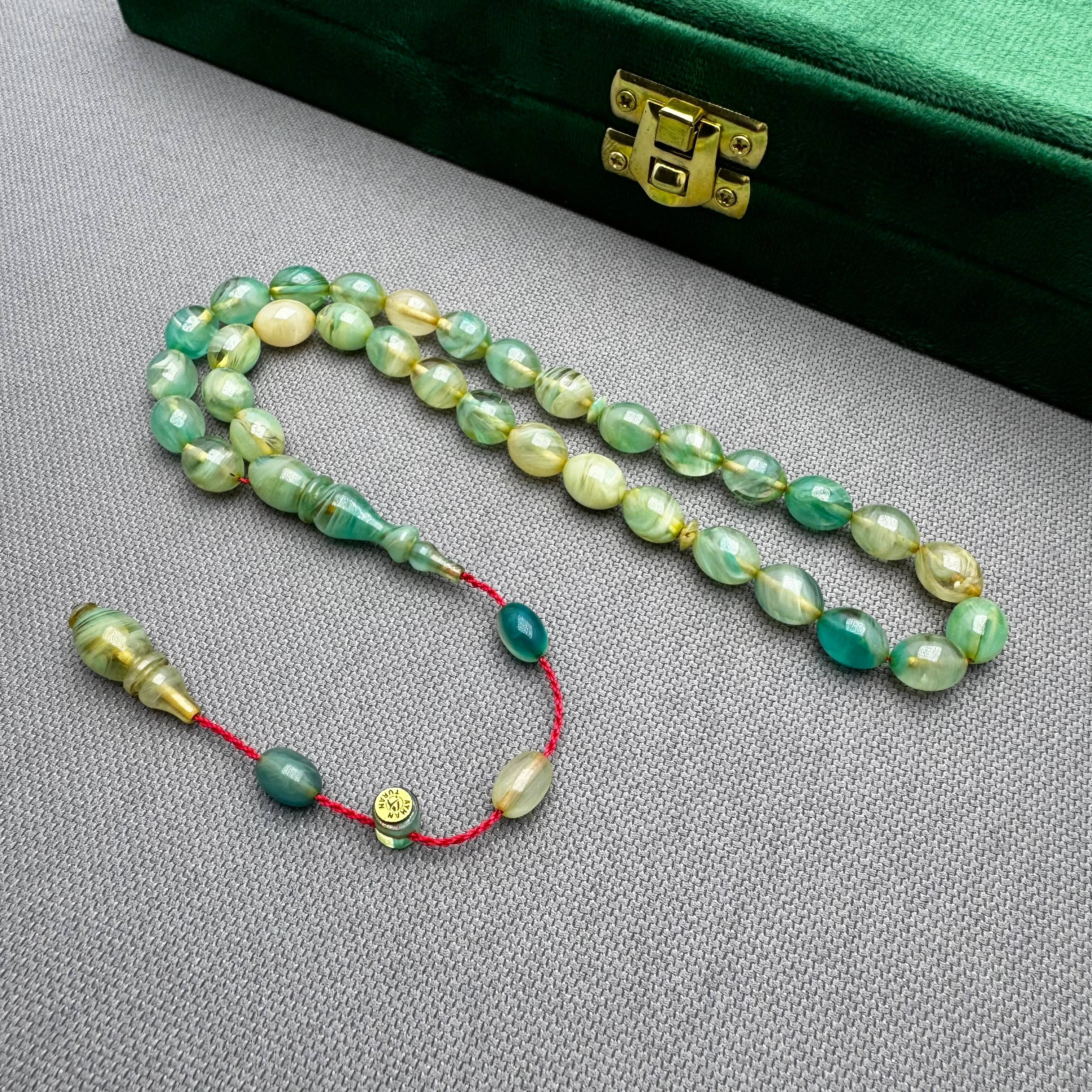 Ayhan TURAN Usta İşçilikli Yeşil Beyzi Kesim Yoğun Hareli Ateş Kehribar Tespih