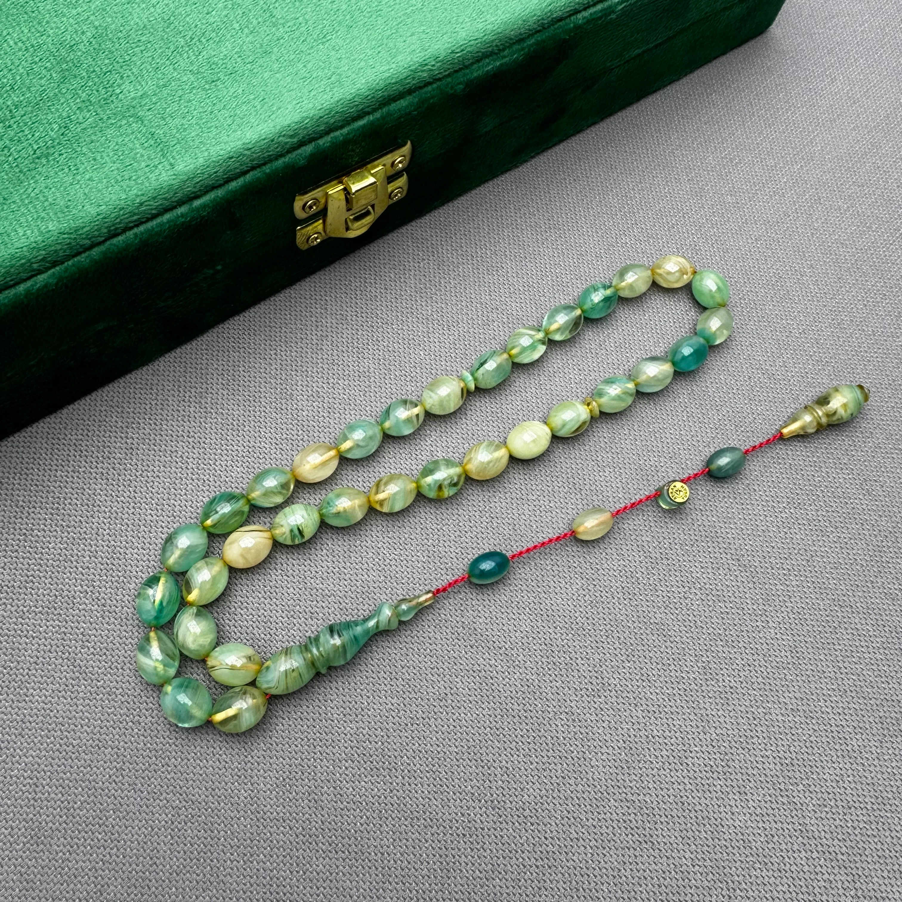 Ayhan TURAN Usta İşçilikli Yeşil Beyzi Kesim Yoğun Hareli Ateş Kehribar Tespih