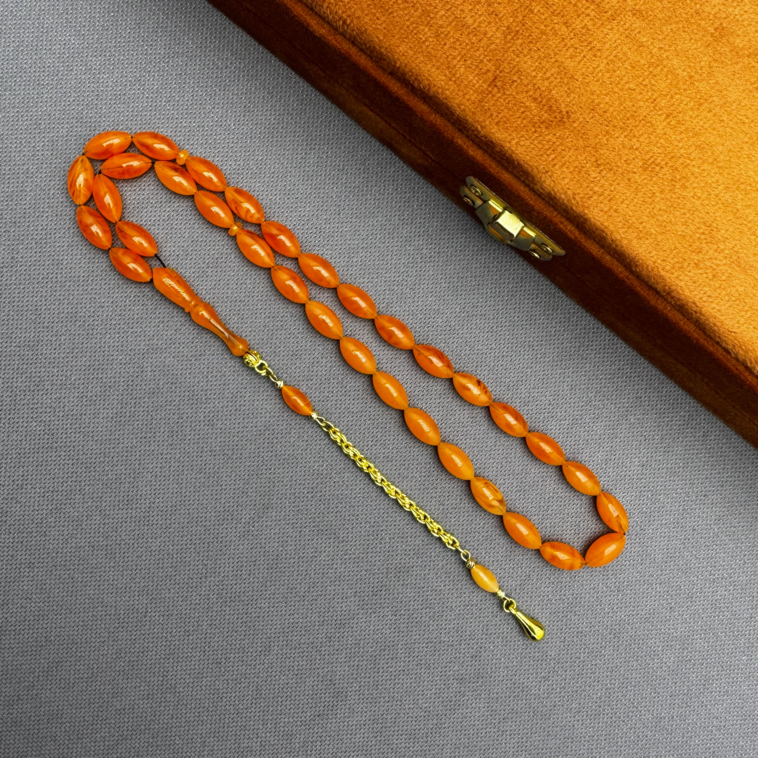 Usta İşçilikli 925 Ayar Gümüş Püsküllü Turuncu Hareli Alman Bakalit Tespih