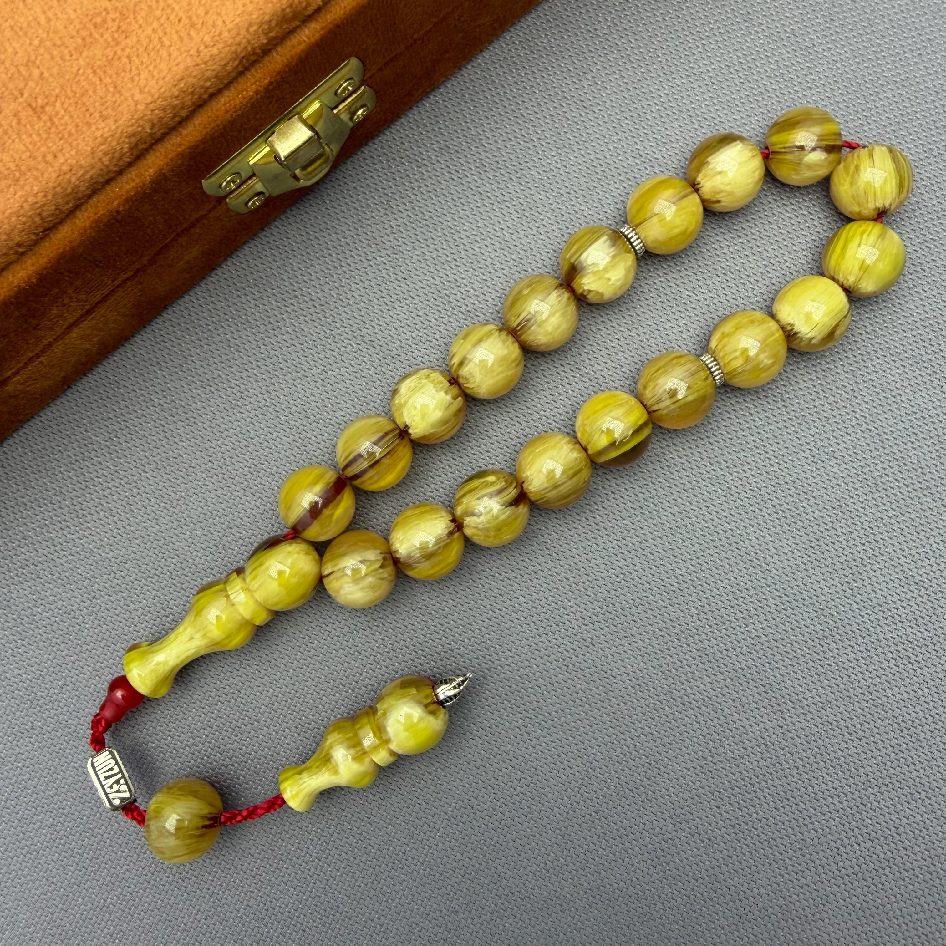 Zeyzun Usta İşçilikli Sarı Şeffaf Hareli Küre Kesim Efe Maskot Sıkma Kehribar Tespih