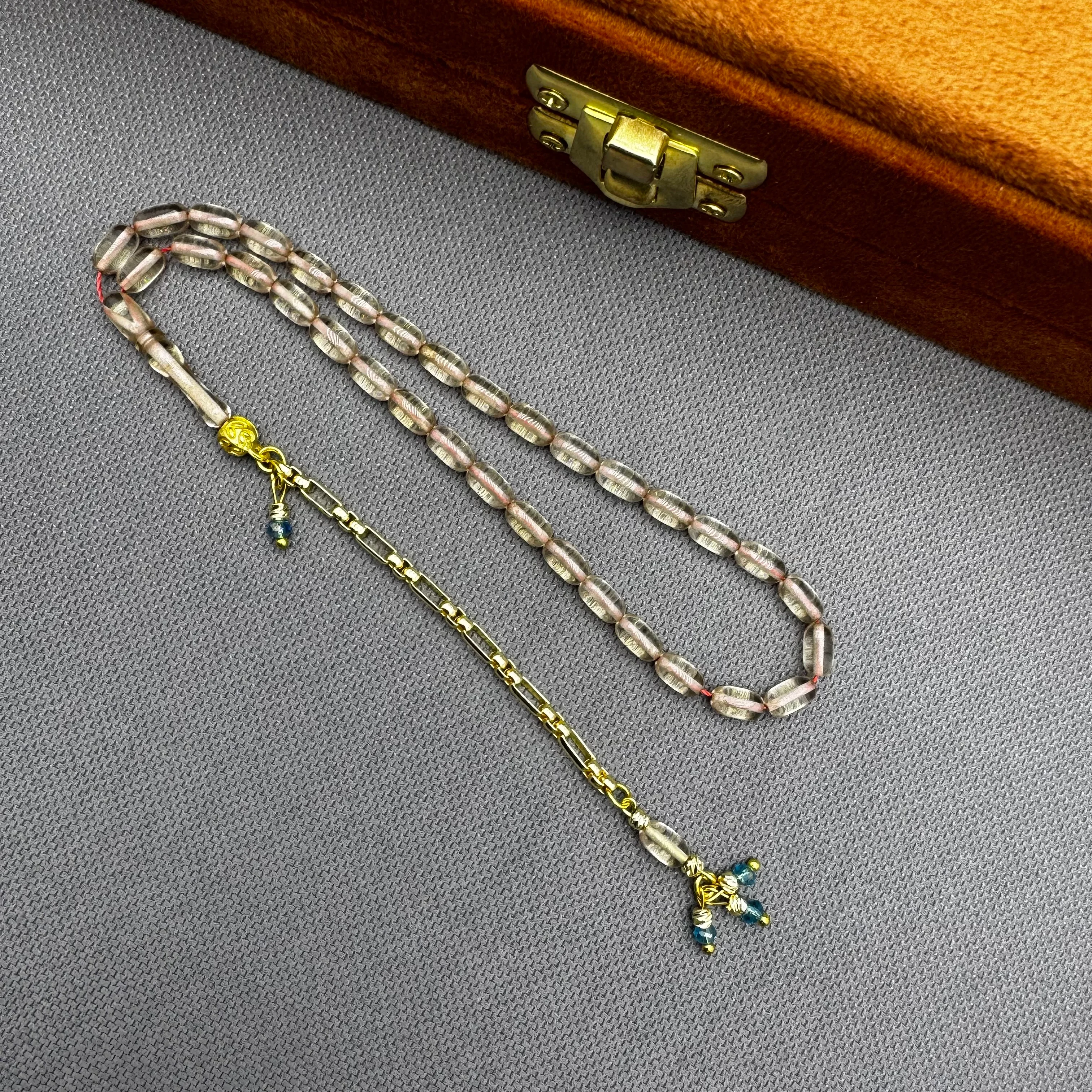 Özel Dizayn Pirinç Püsküllü Şeffaf Bilek Boy Sıkma Kehribar Tespih