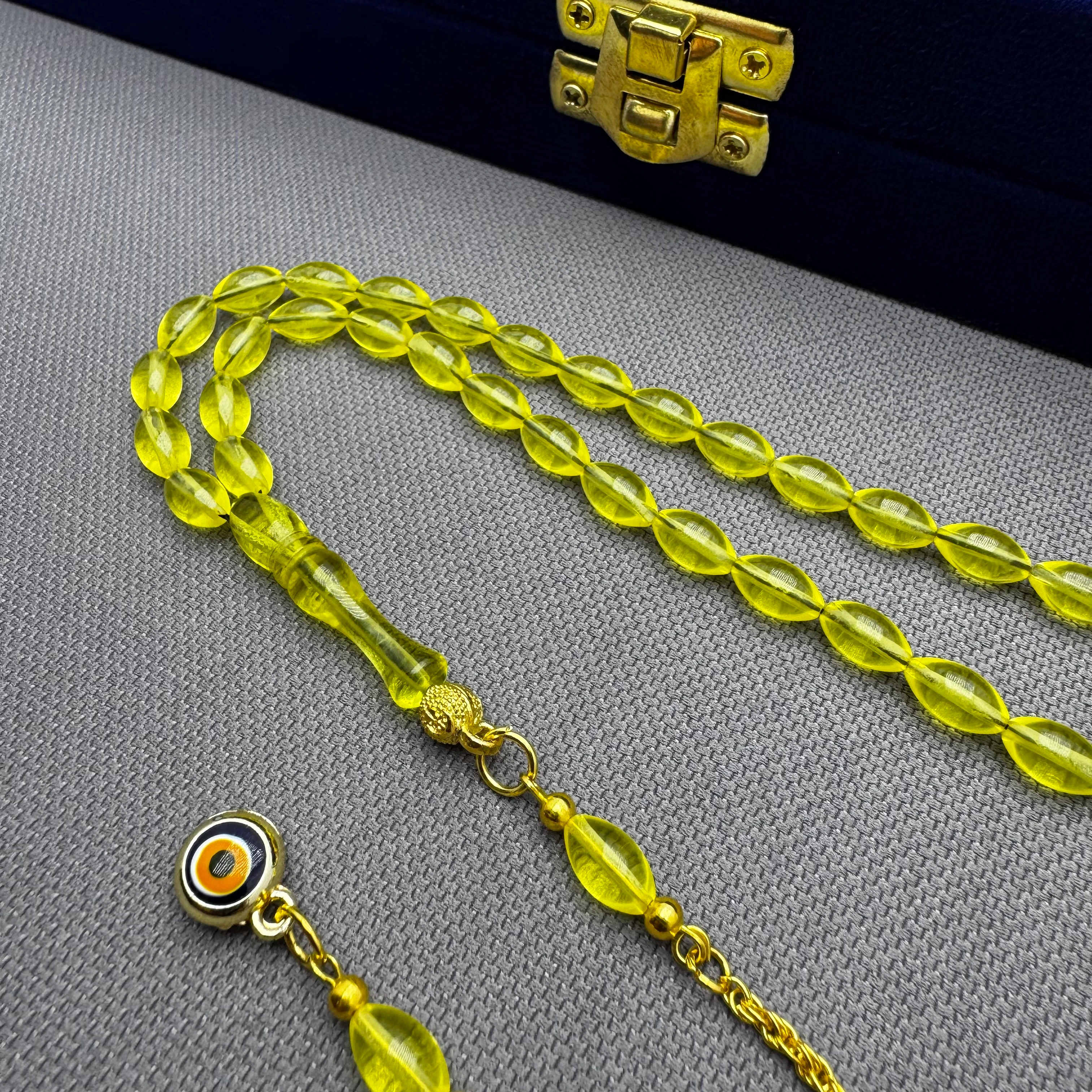 Nazar Boncuğu Detaylı Pirinç Püsküllü Bilek Boy Sarı Uçak Camı Tespih